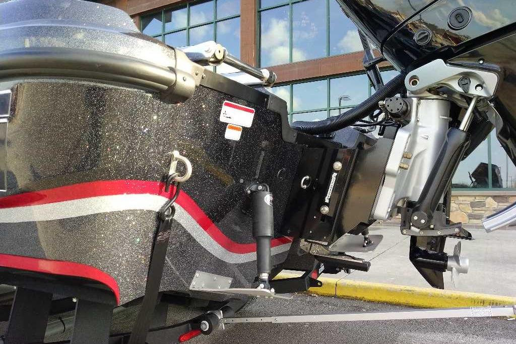 2024 Nitro ZV21 Pro boat with sleek design and powerful engine, parked outdoors.