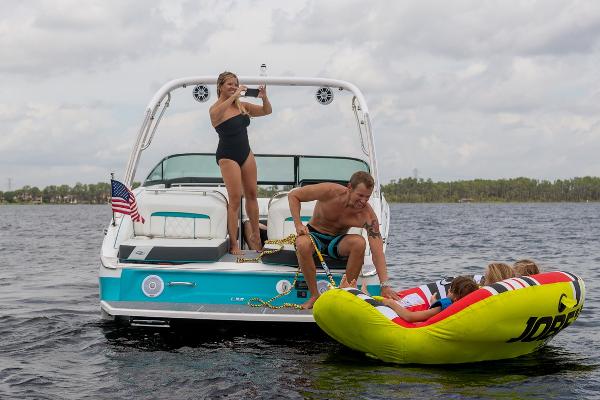 Manufacturer Provided Image: Family enjoying water activities on a 2026 Regal LS6 boat.