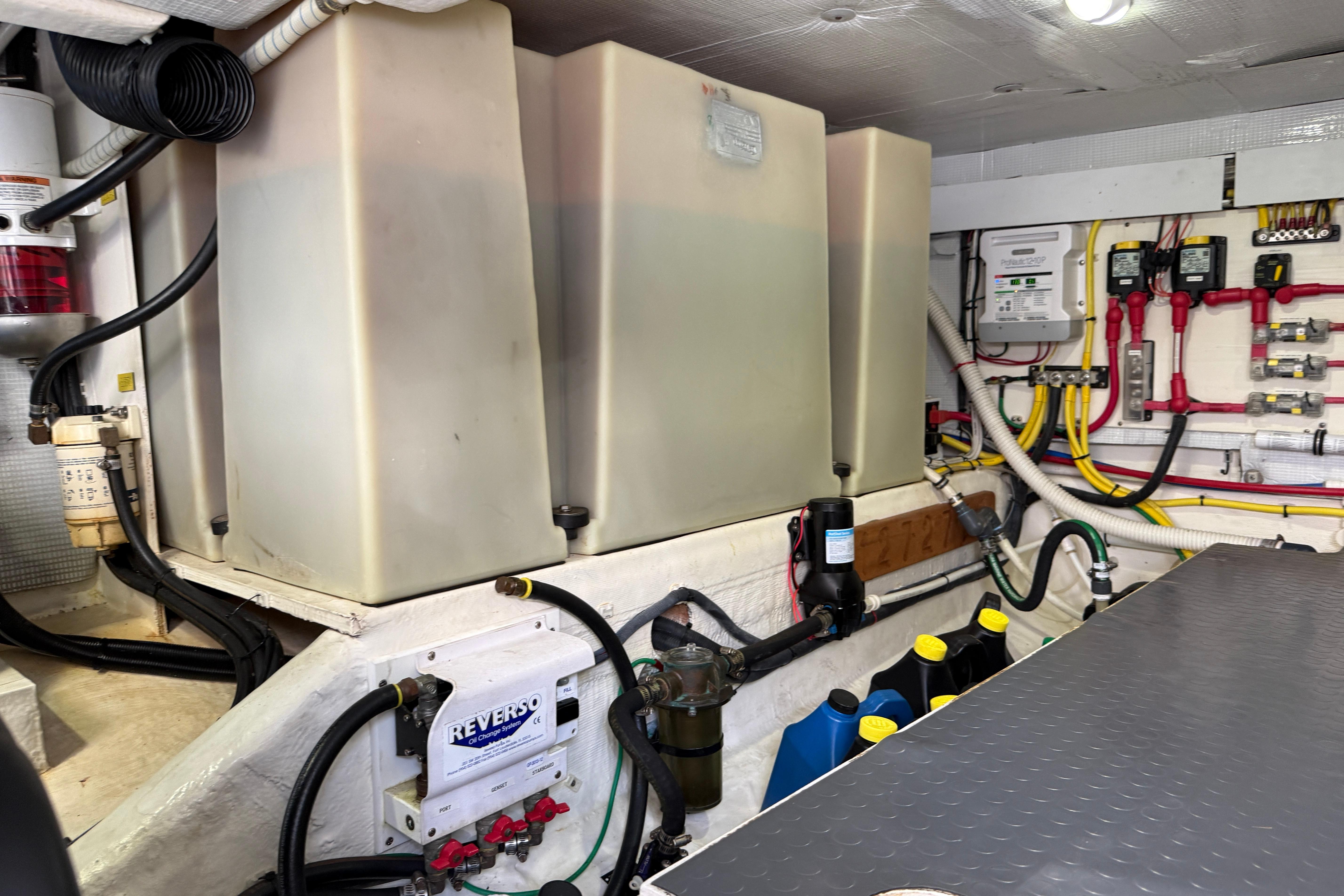 Engine room of 2017 Sabre 38 Salon Express with fuel tanks and wiring.