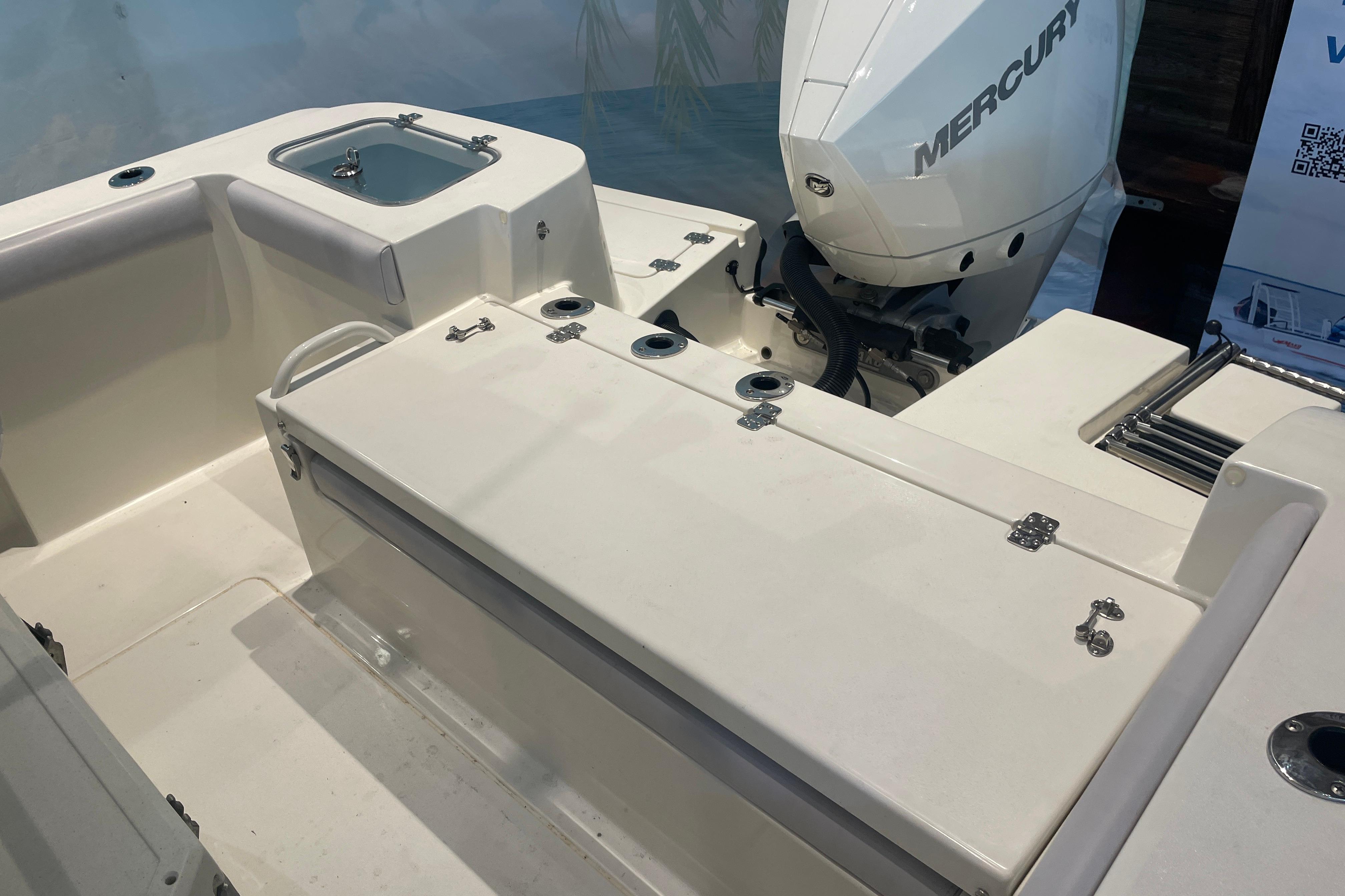 2026 Mako 226 Center Console boat with Mercury engine, featuring spacious deck layout.