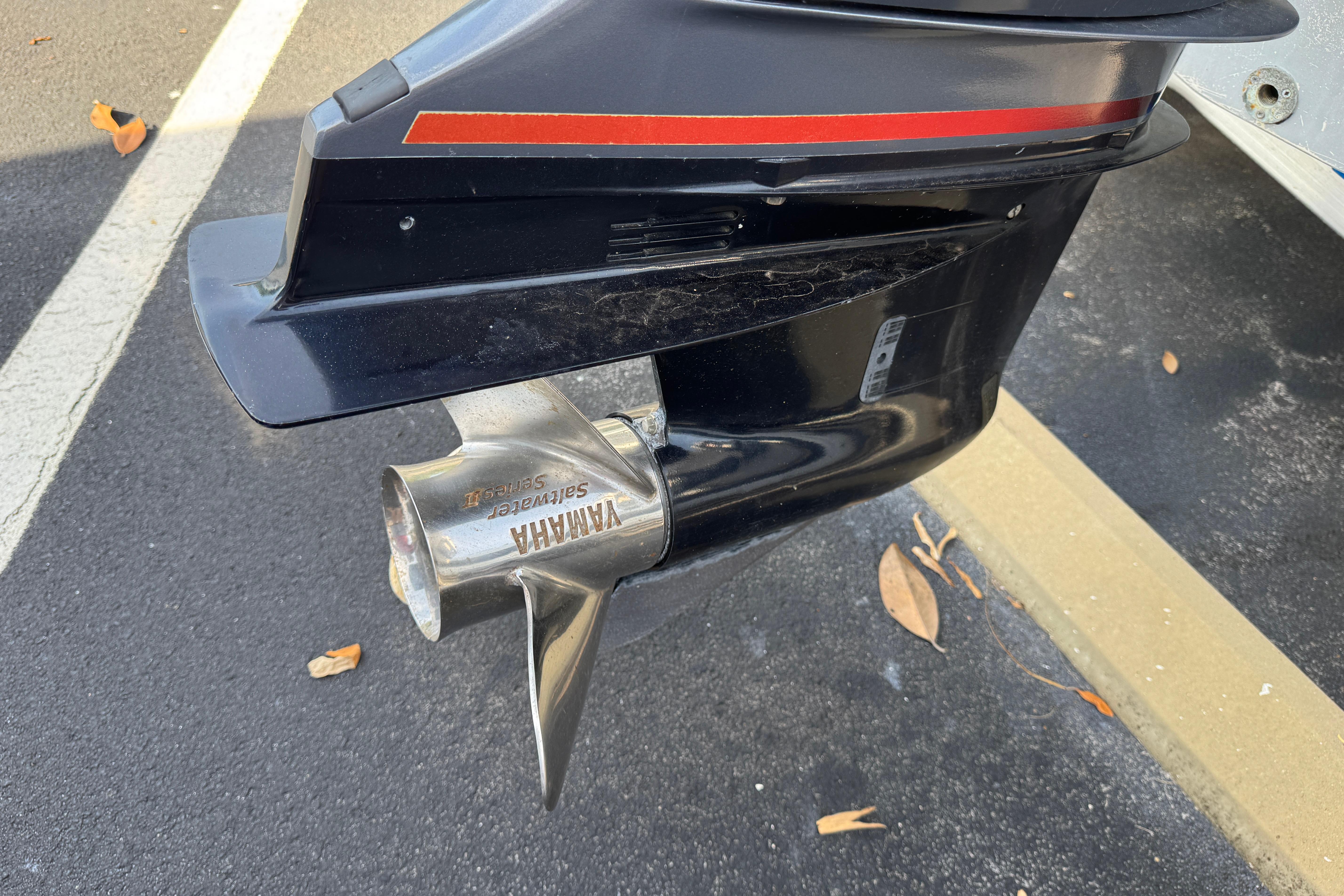 Close-up of a Yamaha outboard motor propeller on a 2018 Hurricane SunDeck 2400 OB boat.