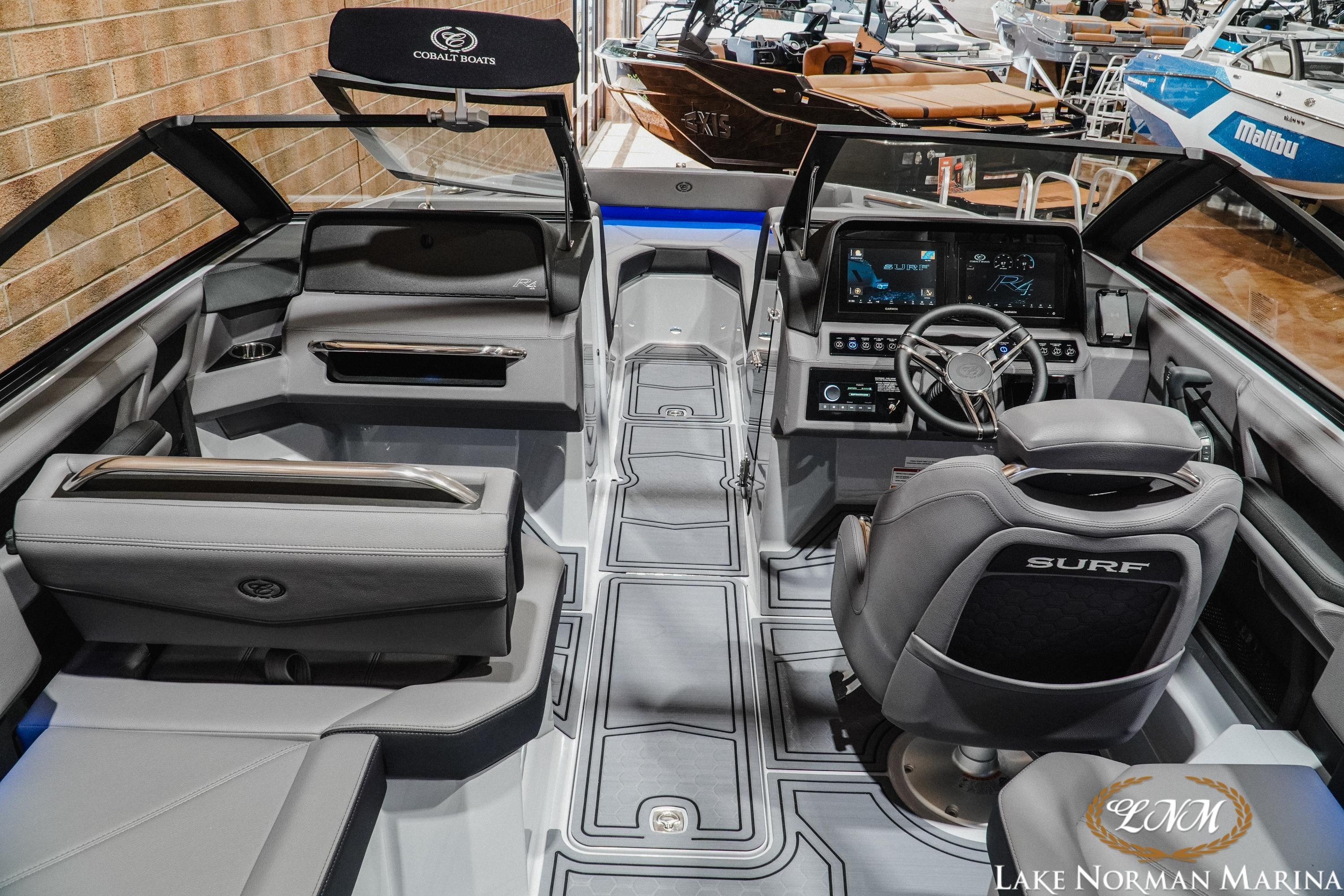 Interior of 2026 Cobalt R4 Surf boat with modern dashboard and seating at Lake Norman Marina.