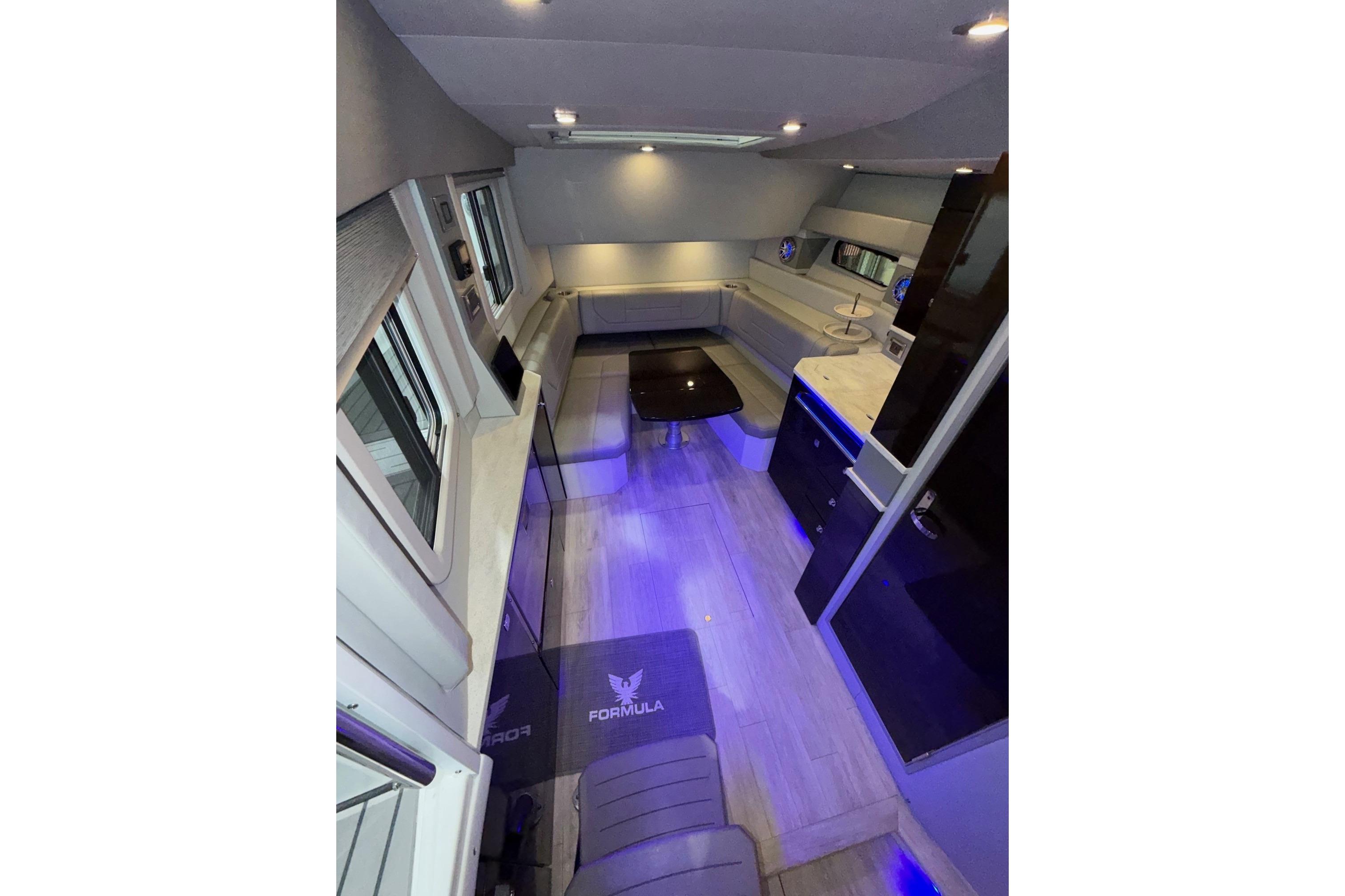 Luxurious interior of a 2017 Formula 430 Super Sport Crossover with modern design and ambient lighting.
