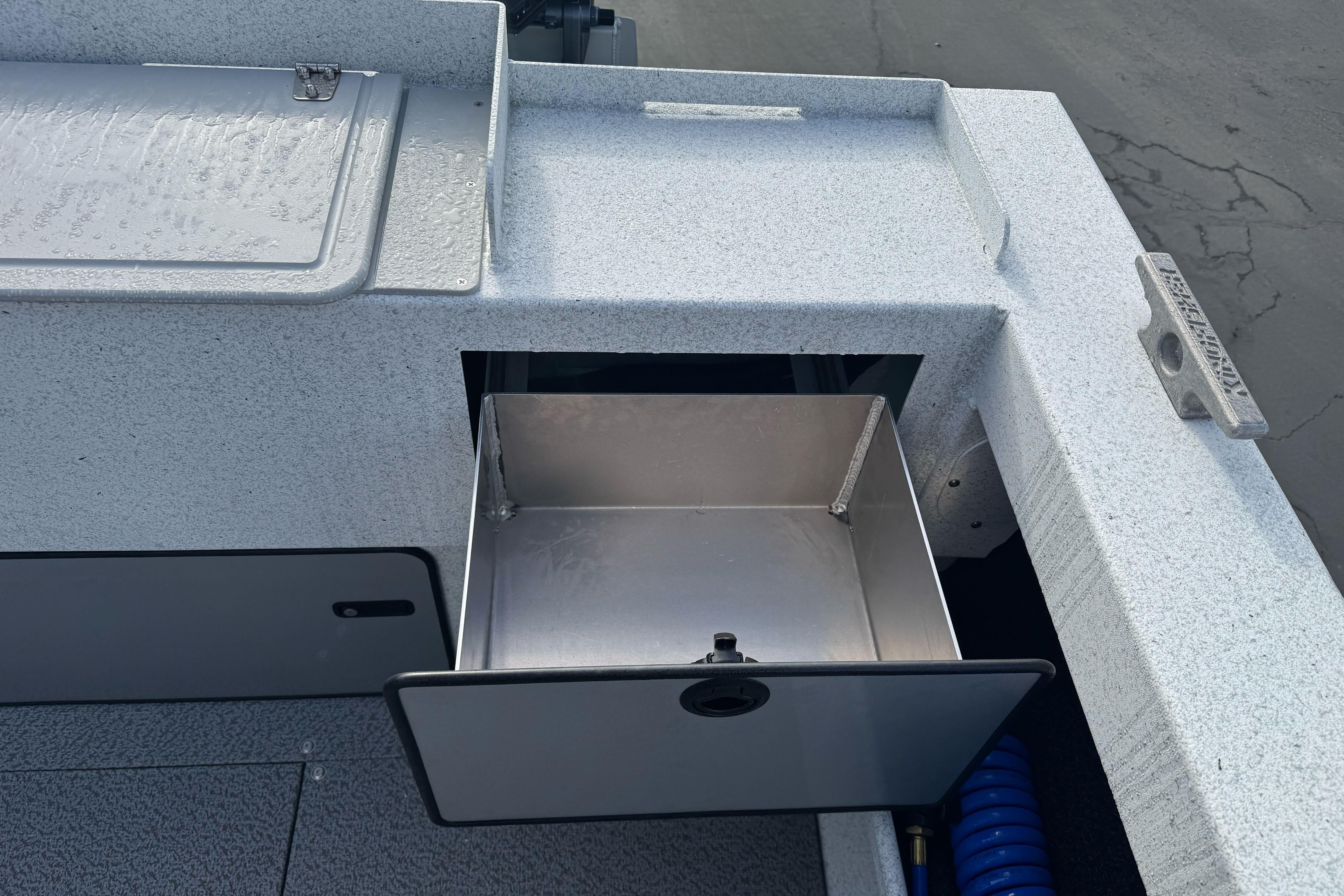 KingFisher 2025 Escape boat storage compartment, open with visible interior, 2026 model.