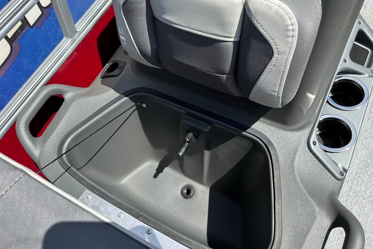 2026 Sun Tracker Bass Buggy 16 XL Select boat seat with storage compartment and cup holders.
