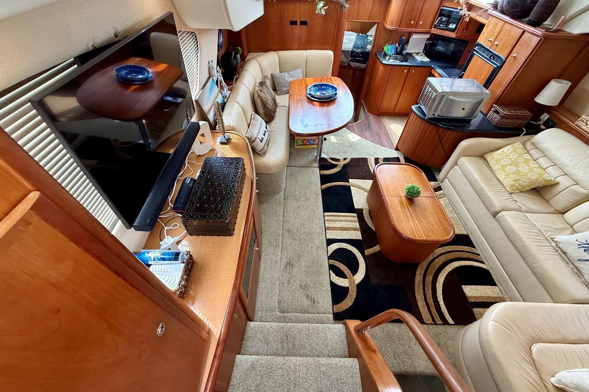Luxurious interior of 2004 Silverton 39 Motor Yacht with elegant furnishings and modern amenities.