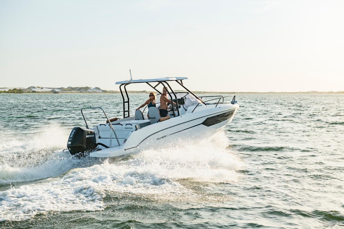 2026 Beneteau Flyer 8 SUNdeck cruising on open water, showcasing sleek design and performance.