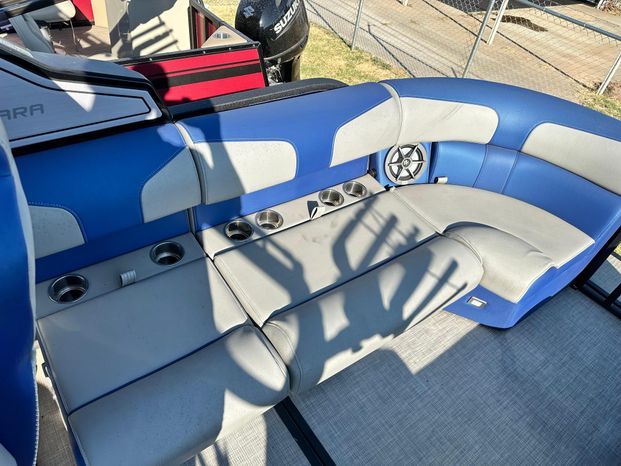 Interior of 2023 Montara 25' SURF BOSS 2.0 with blue and gray seating.