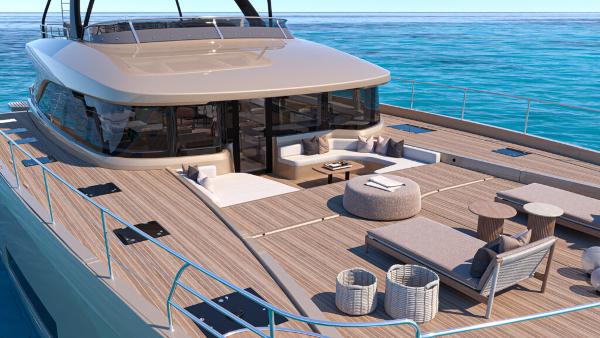 Luxurious 2025 Lagoon 83 yacht with spacious deck and modern seating on tranquil sea.