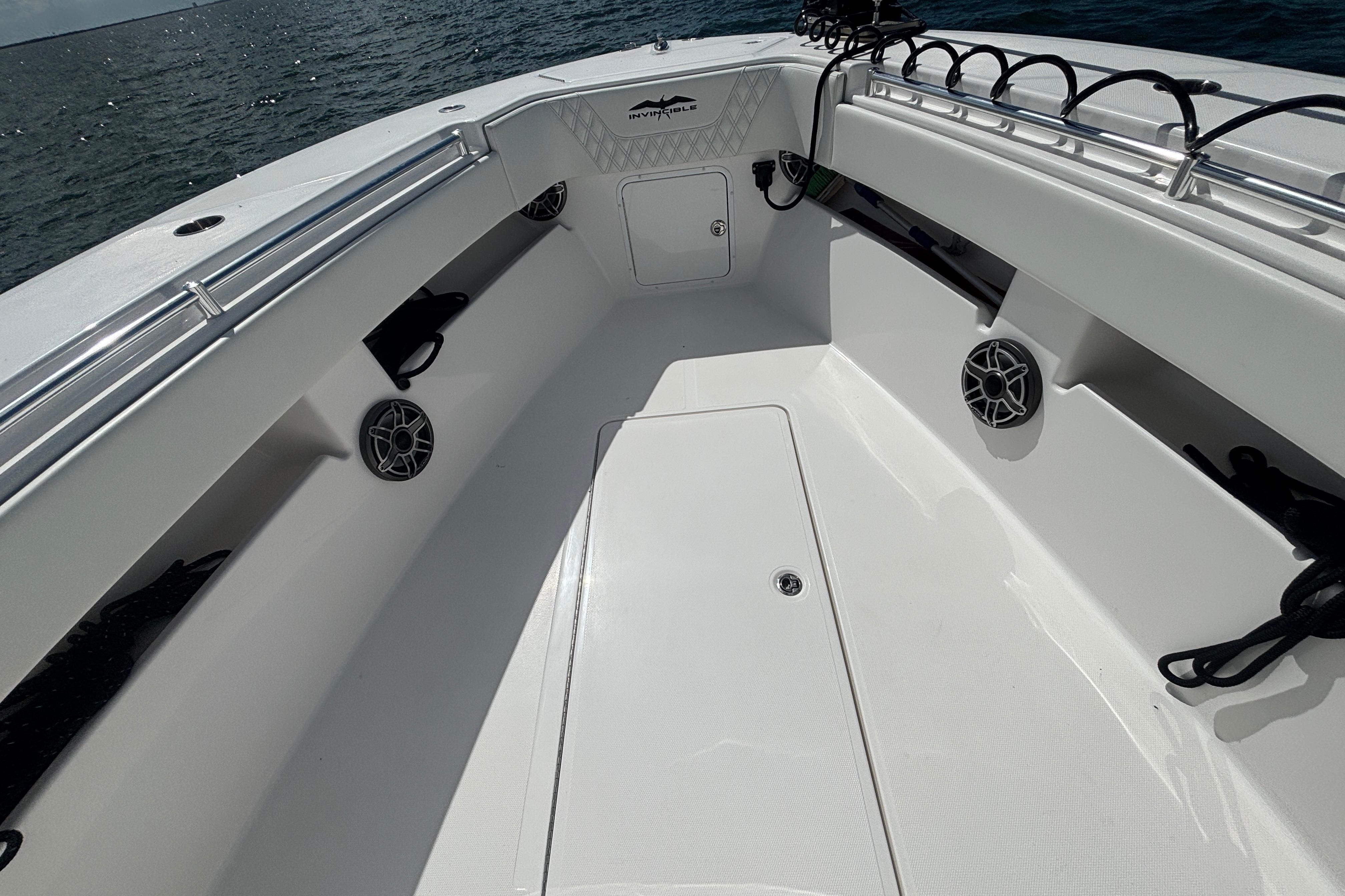 2024 Invincible 36 Open Fisherman boat interior with speakers and storage compartments.