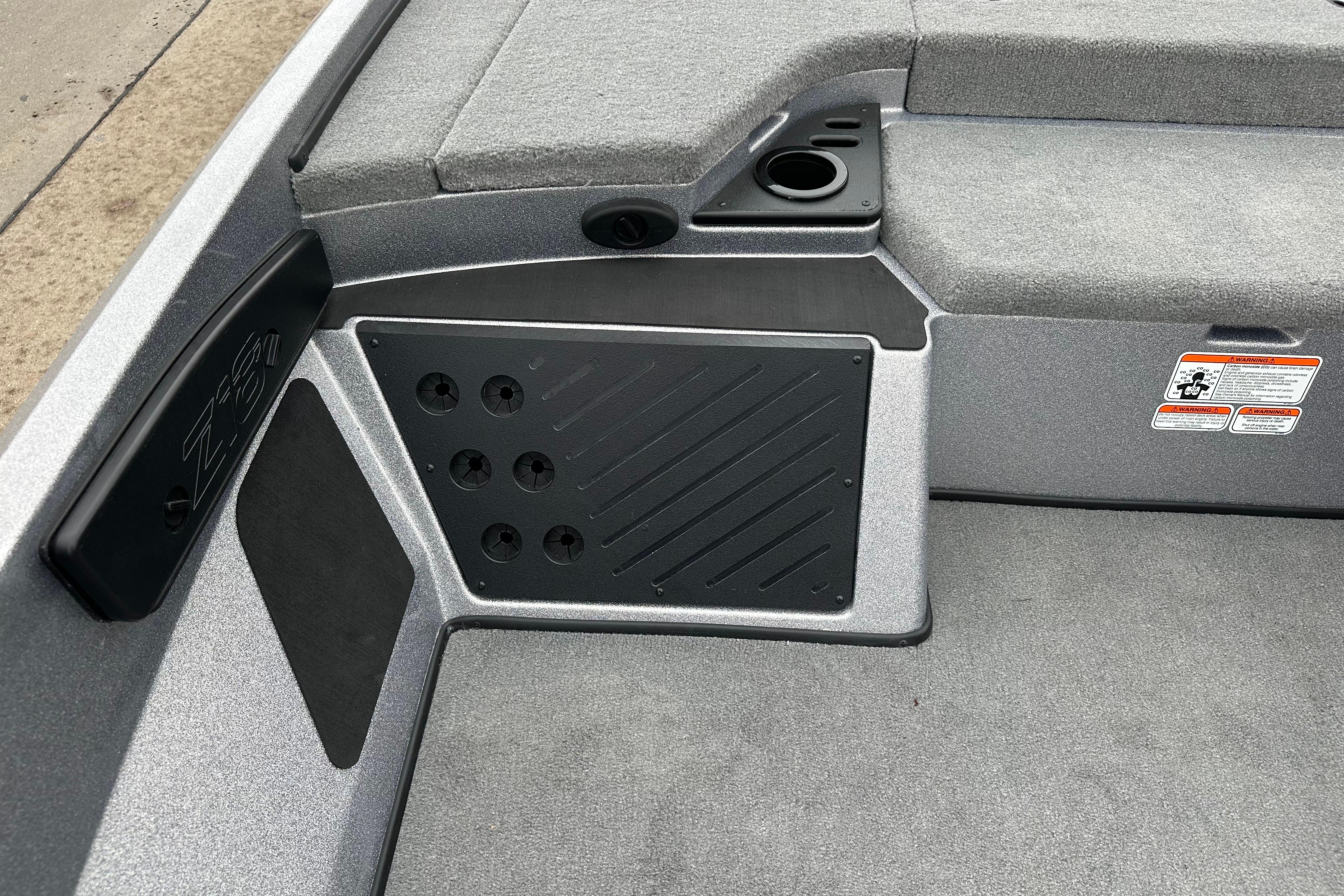 Interior of 2026 Nitro Z18 boat with seating and storage compartments.
