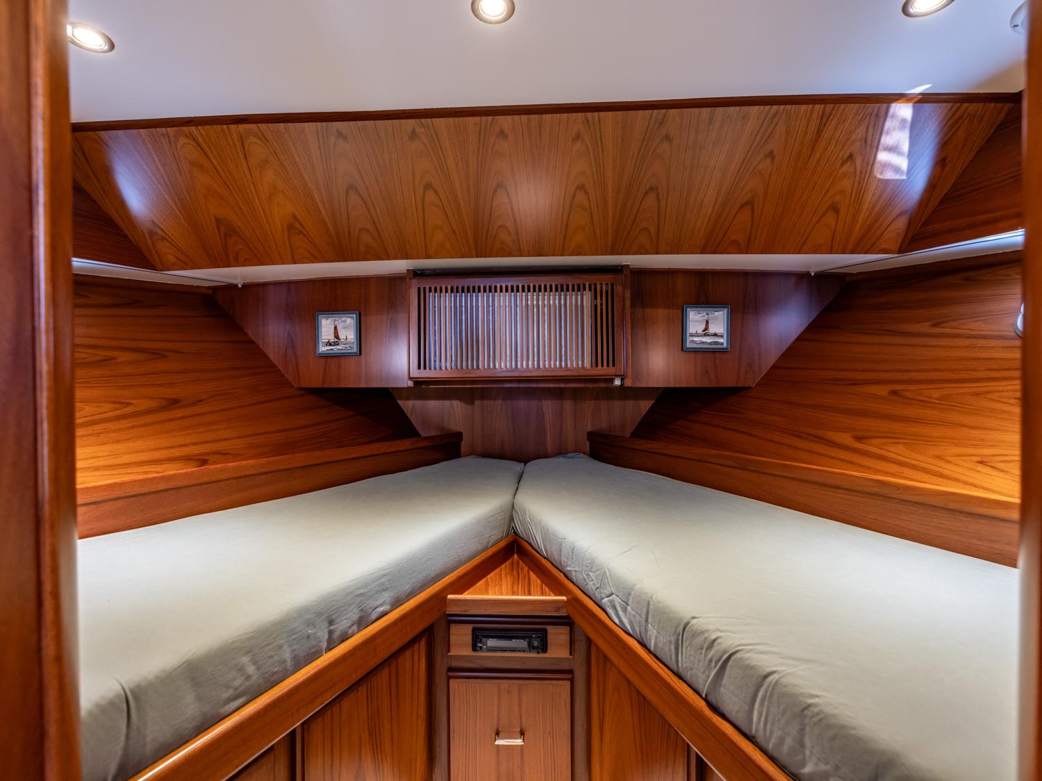 Interior of 1999 Super Van Craft 14.95 yacht with wooden finish.