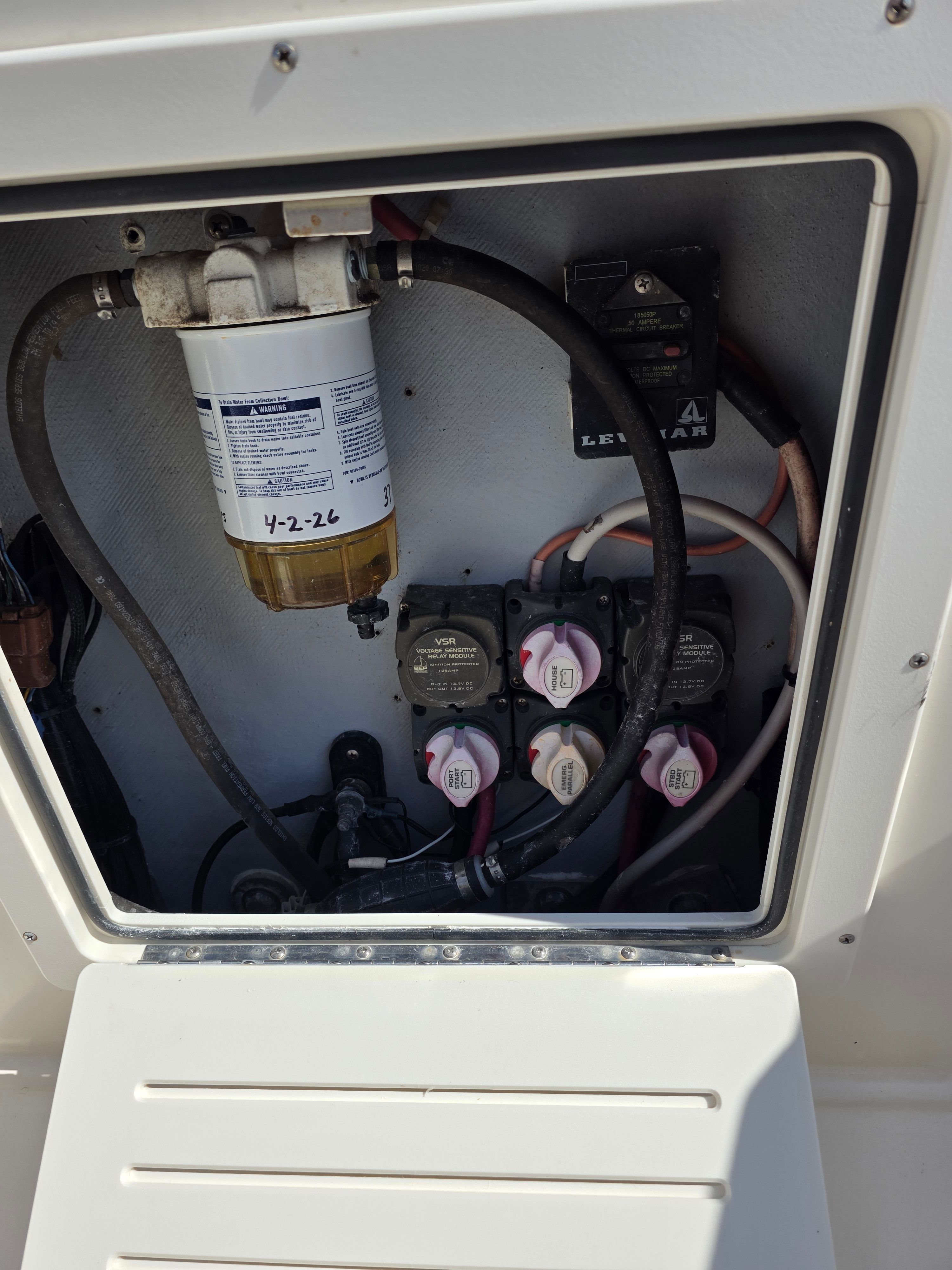 Electrical compartment of a 1987 Mako 248 WAC boat.