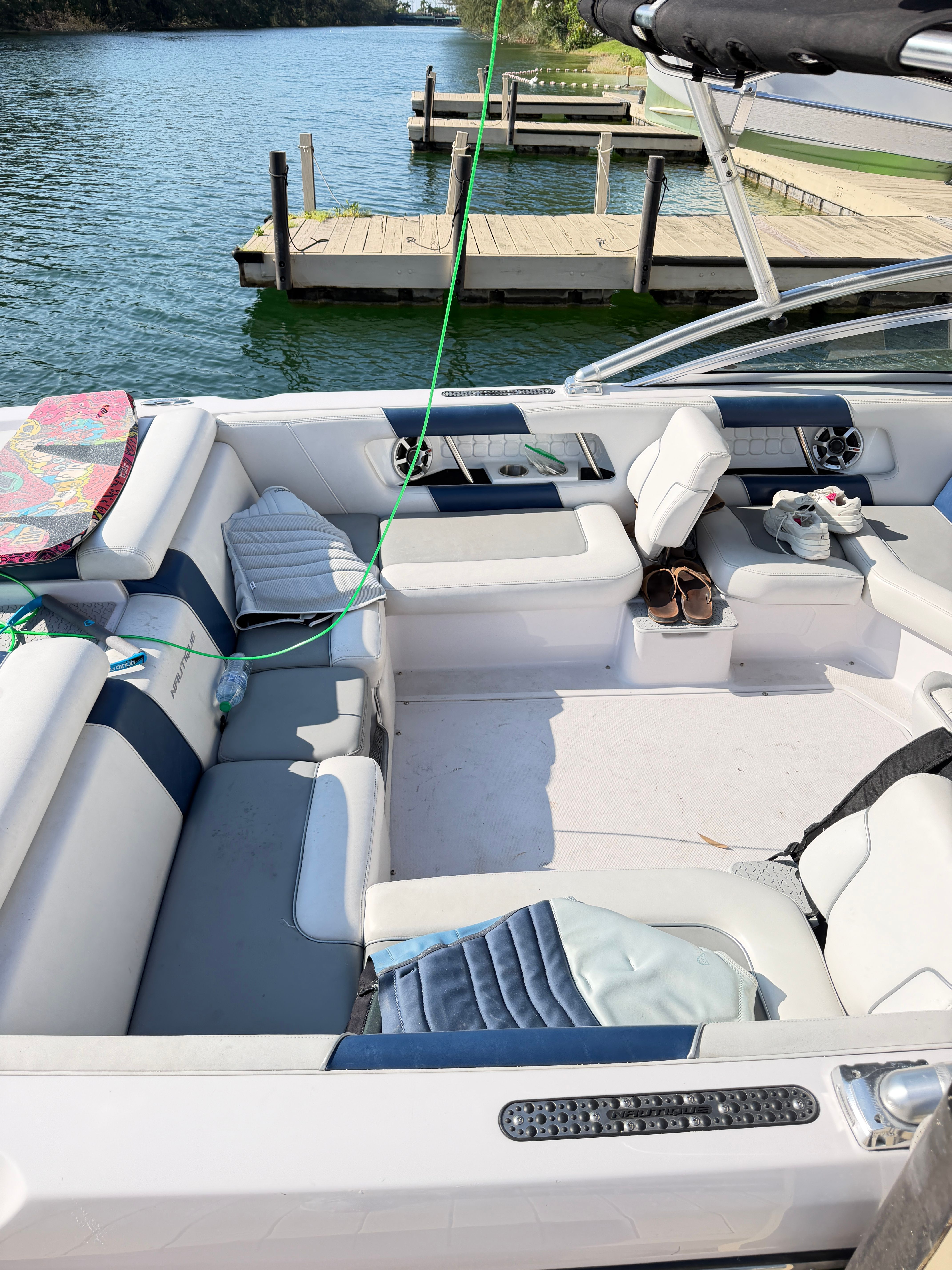 Interior of a 2008 Nautique 236 Team Edition boat at dock.