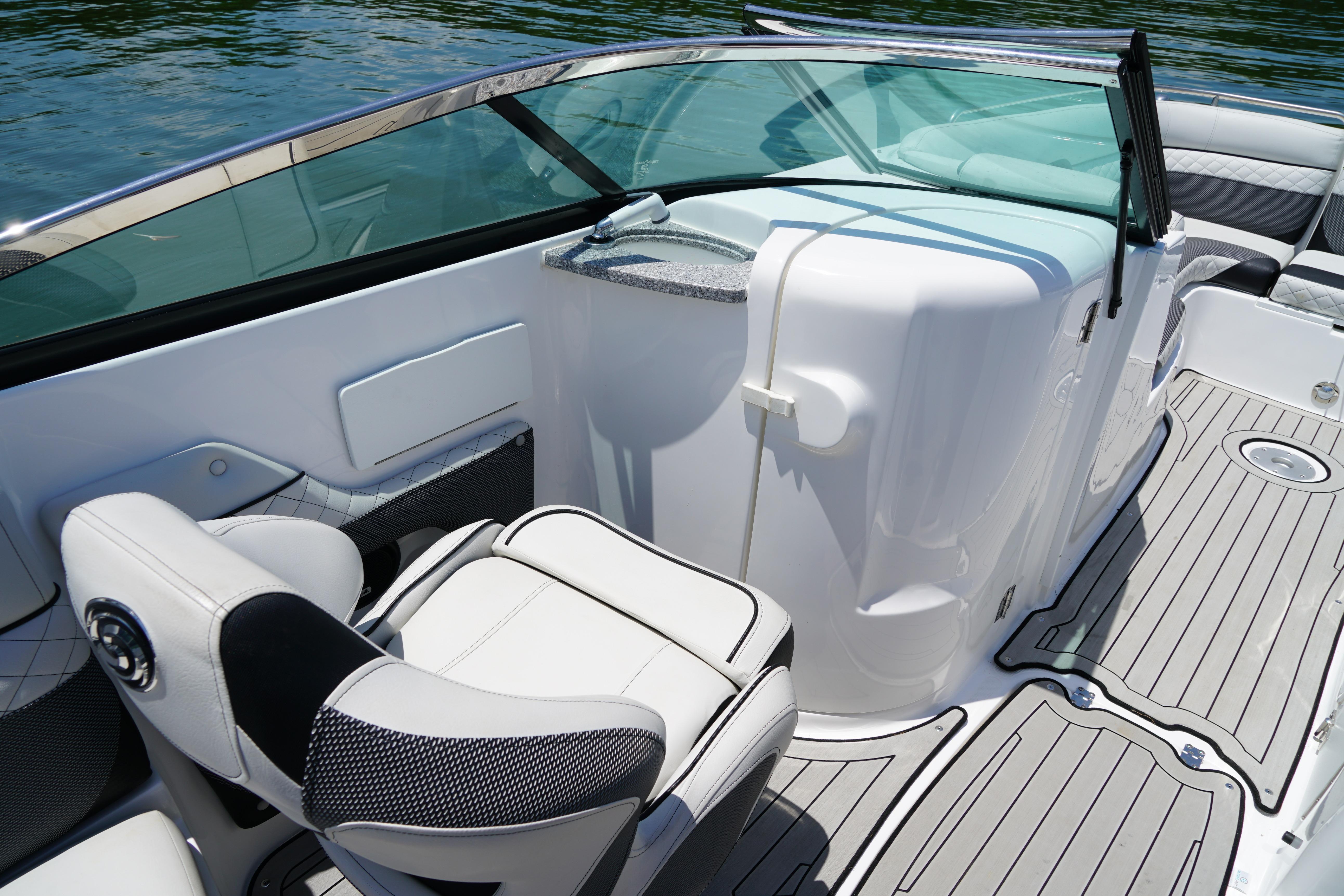 2020 Hurricane SunDeck 2486 OB boat interior with sleek seating and modern design.