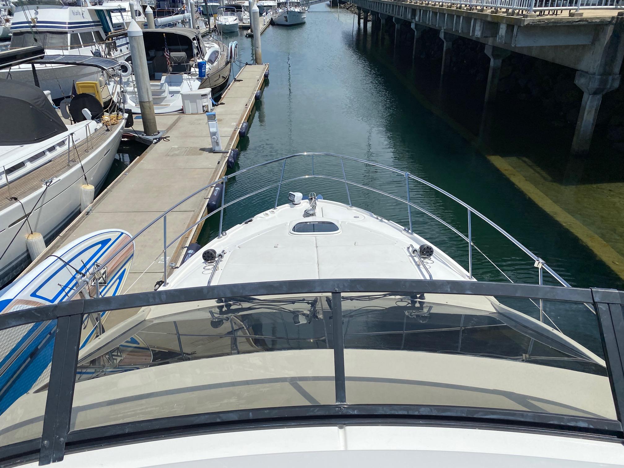 2018 Sea Ray 400 Fly yacht docked at marina, view from flybridge.