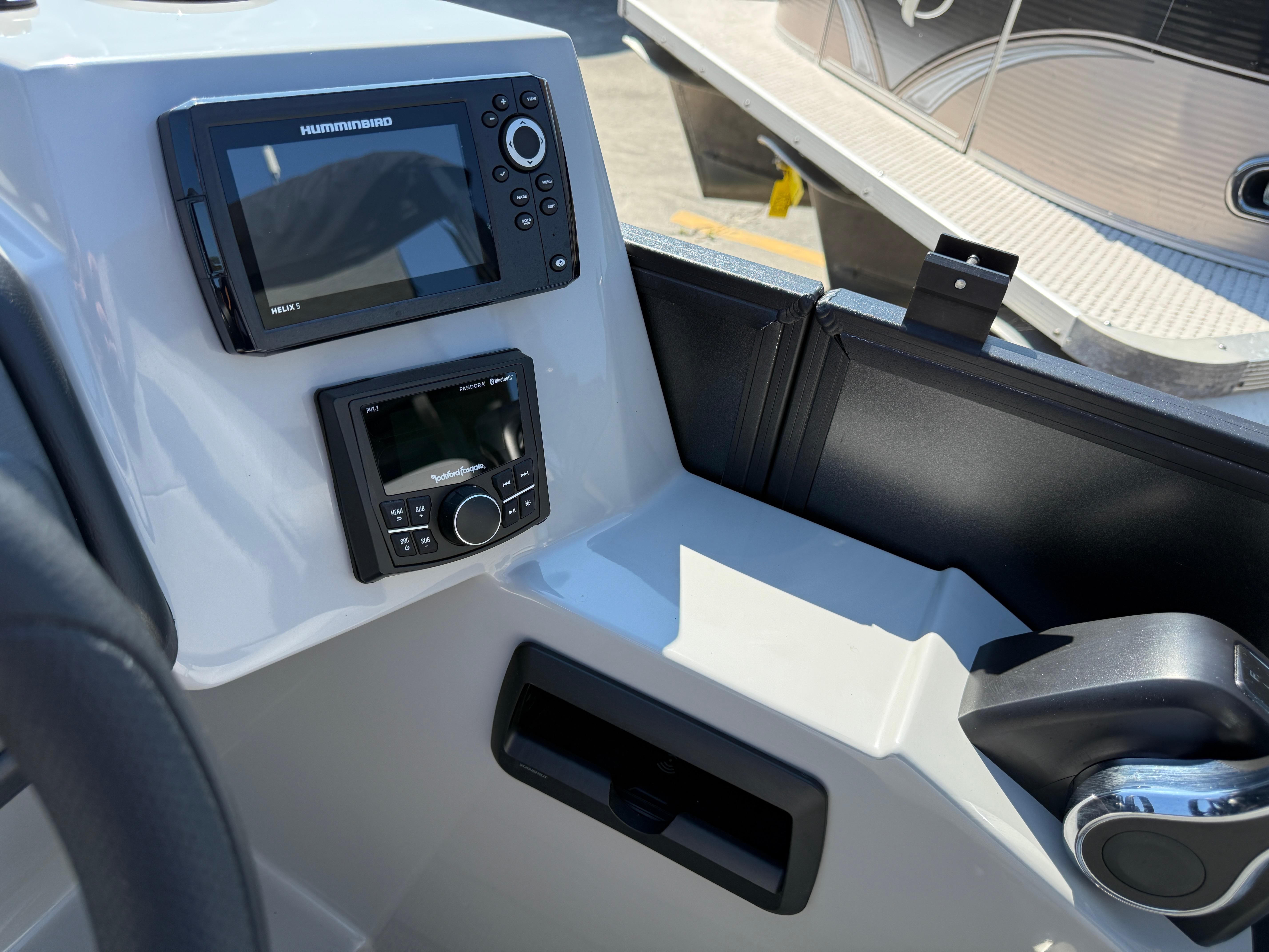 Control panel of 2026 Bentley Pontoons Legacy 223 Navigator with navigation and audio systems.