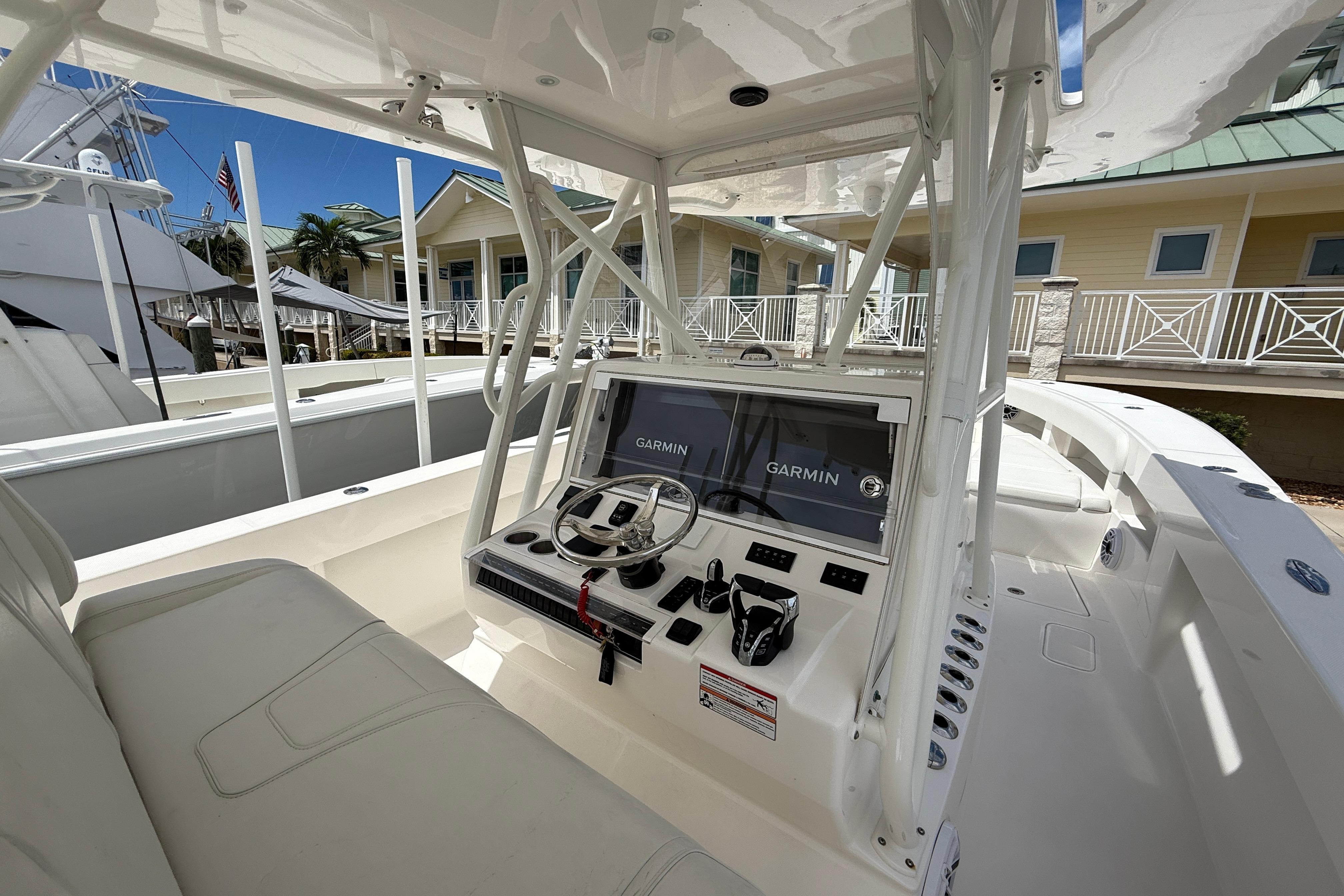 2024 SeaVee 390Z boat interior with Garmin navigation system and modern helm design.