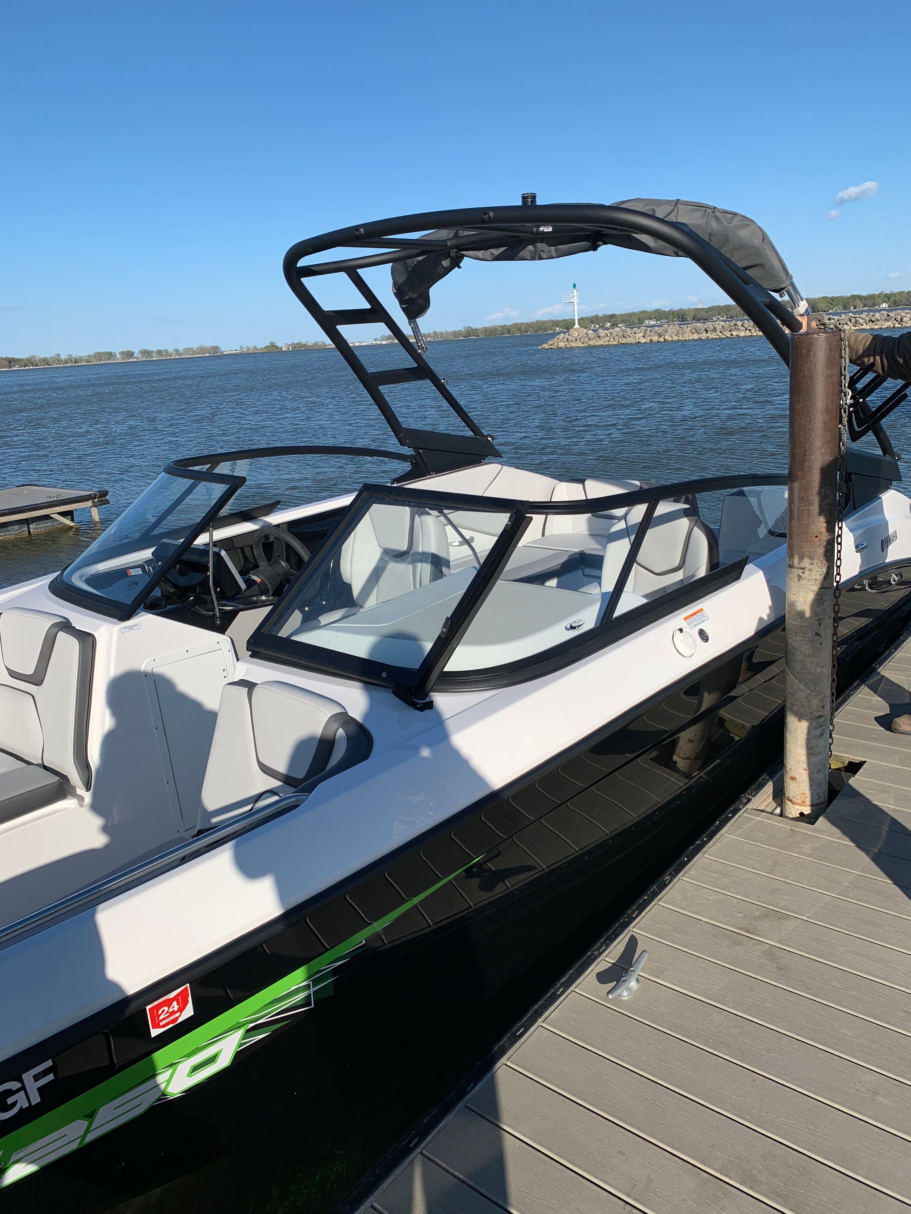 2021 Yamaha AR250 boat docked on a sunny day.