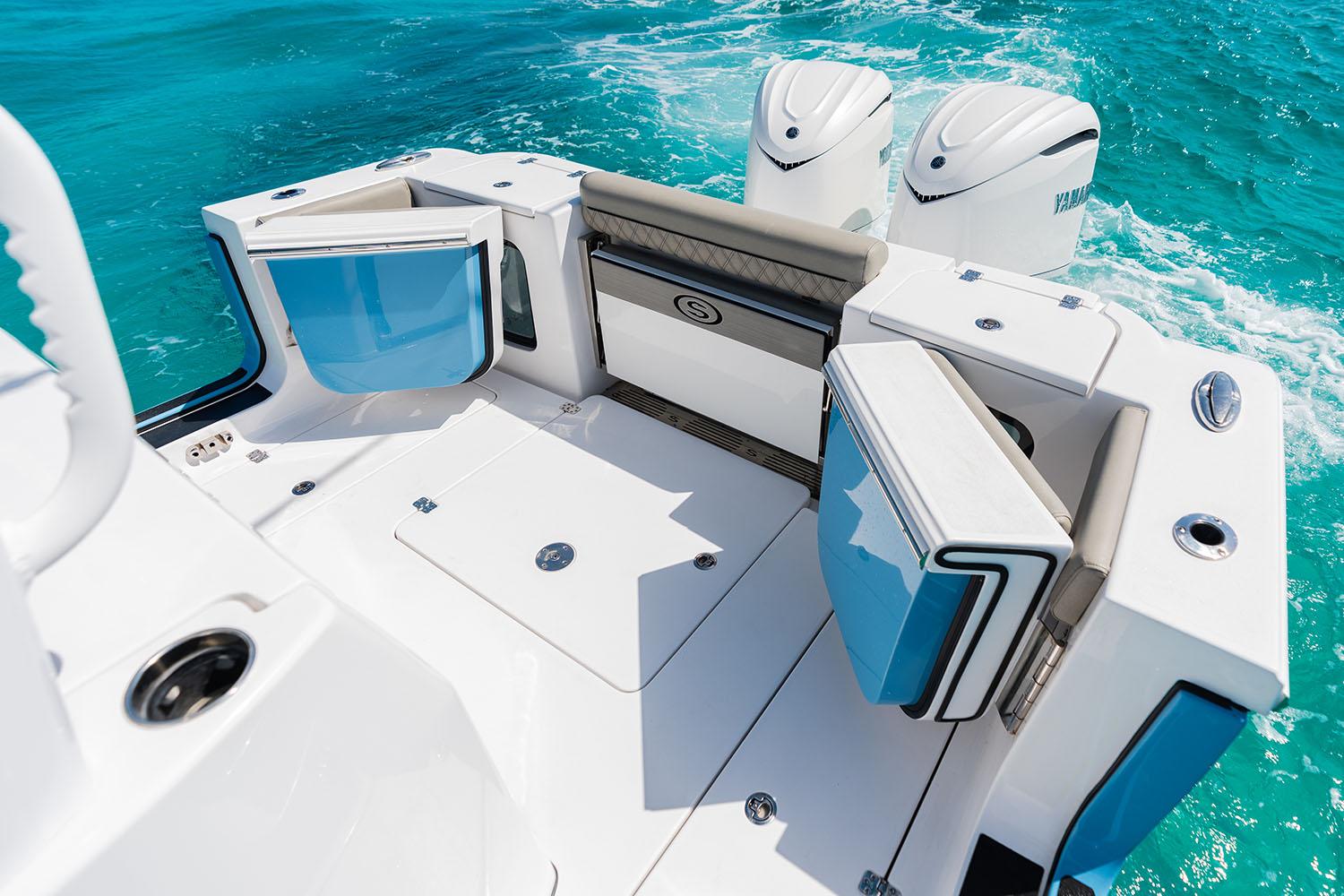 Manufacturer Provided Image: 2025 Sportsman Open 302 Center Console boat with dual engines on turquoise water.