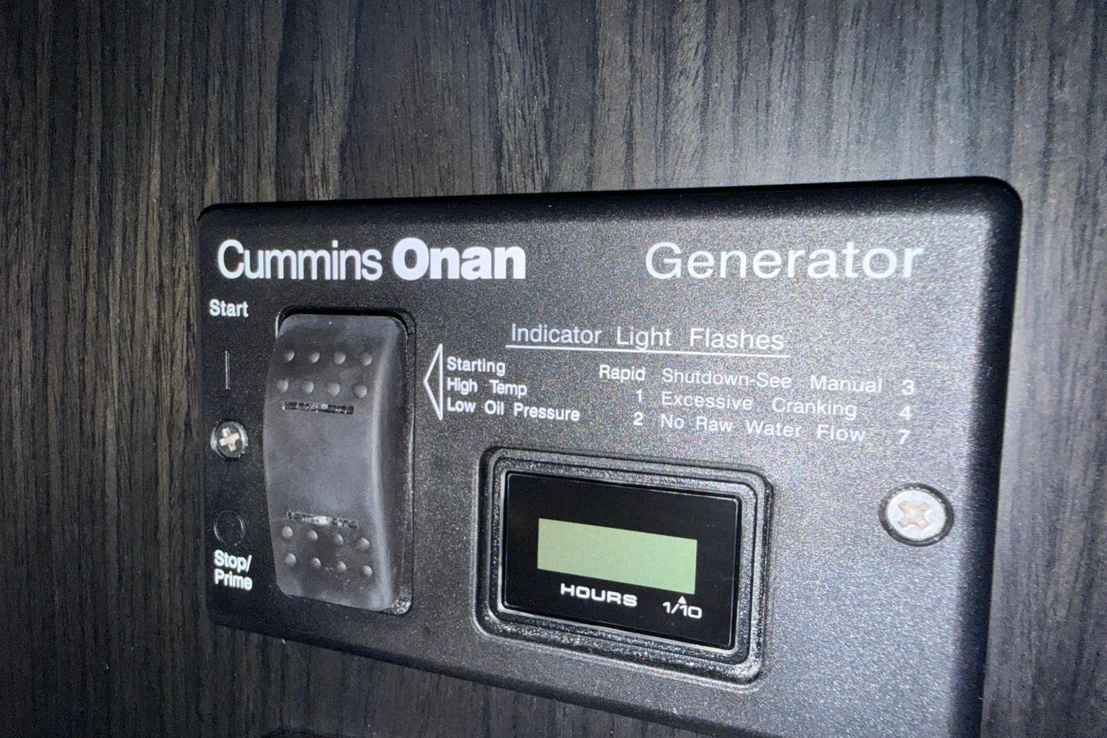 Cummins Onan generator control panel on 2023 Schaefer 400 Sport boat.