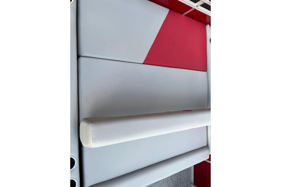 2026 Sun Tracker Party Barge 22 RF XP3 seating with red and gray upholstery.