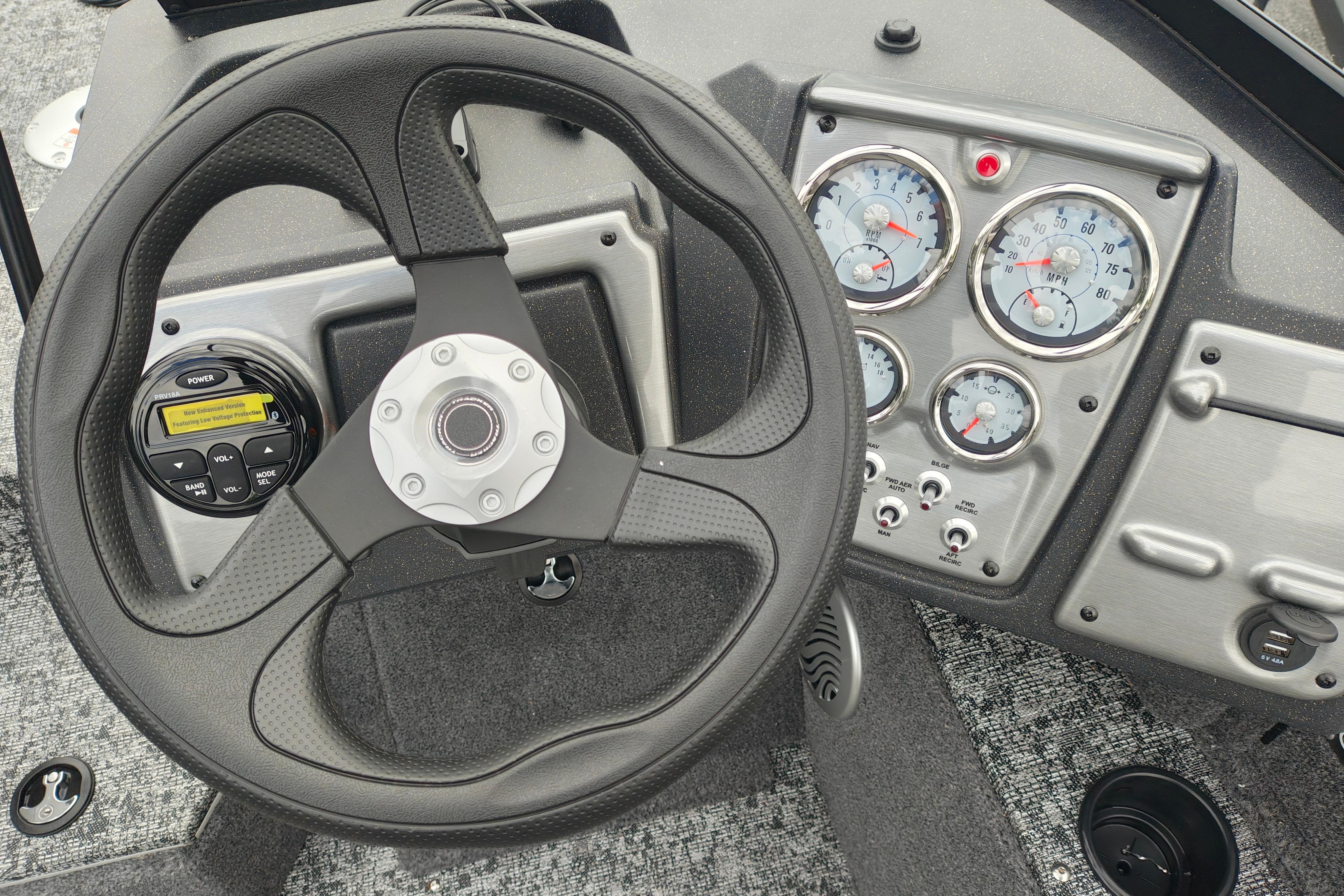 Steering wheel and dashboard of 2026 Tracker Pro Guide V-175 WT boat.