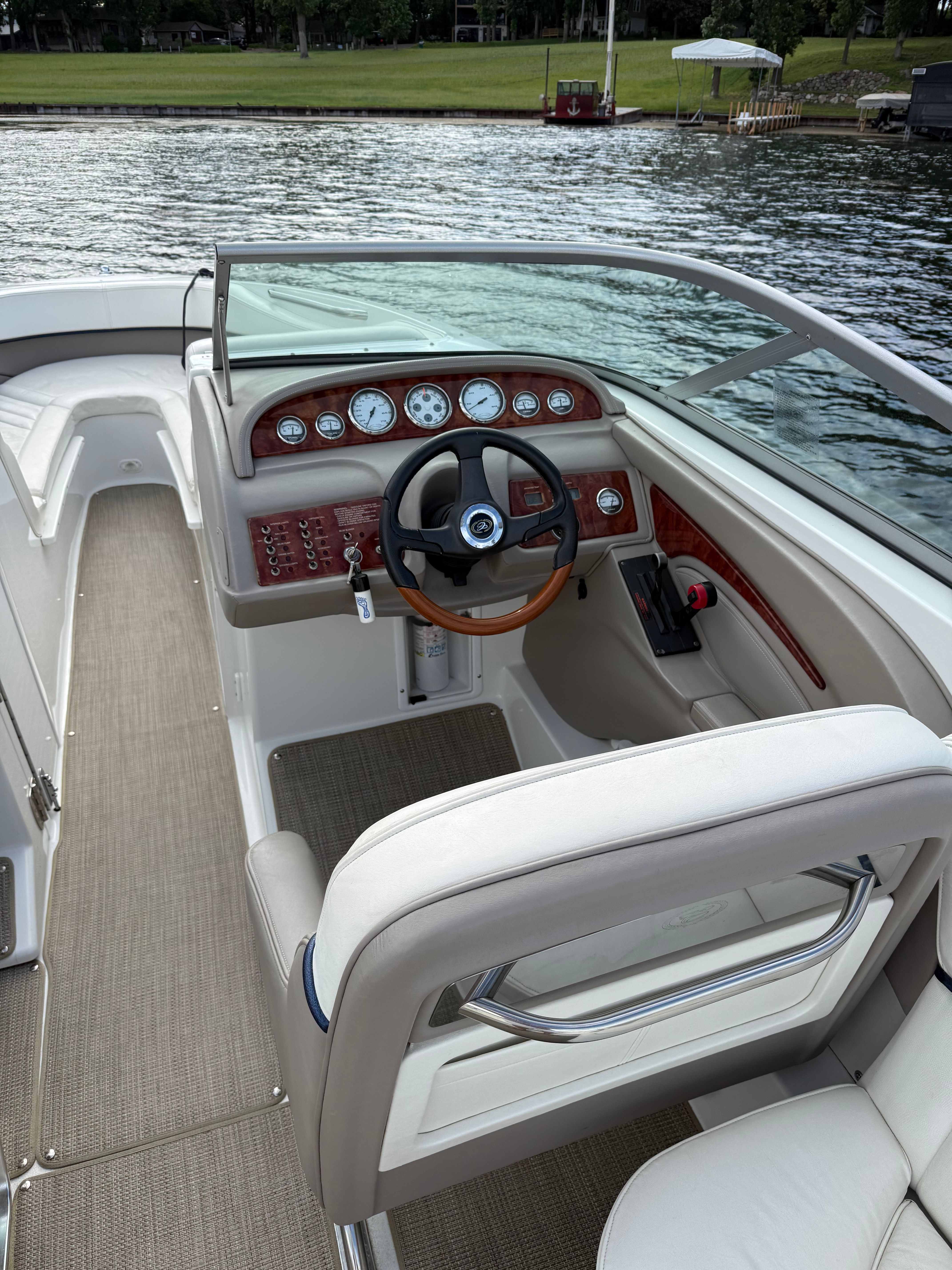 Interior view of a 2003 Cobalt 262 boat on water.