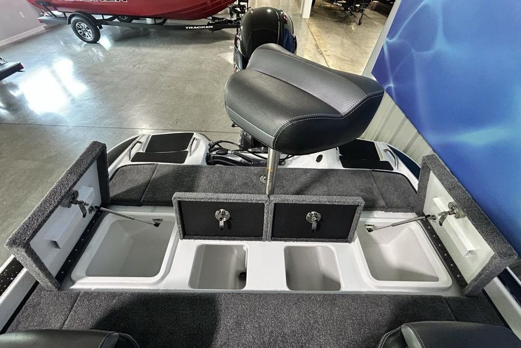 Phoenix 818 Pro 2026 boat interior with storage compartments and seating.