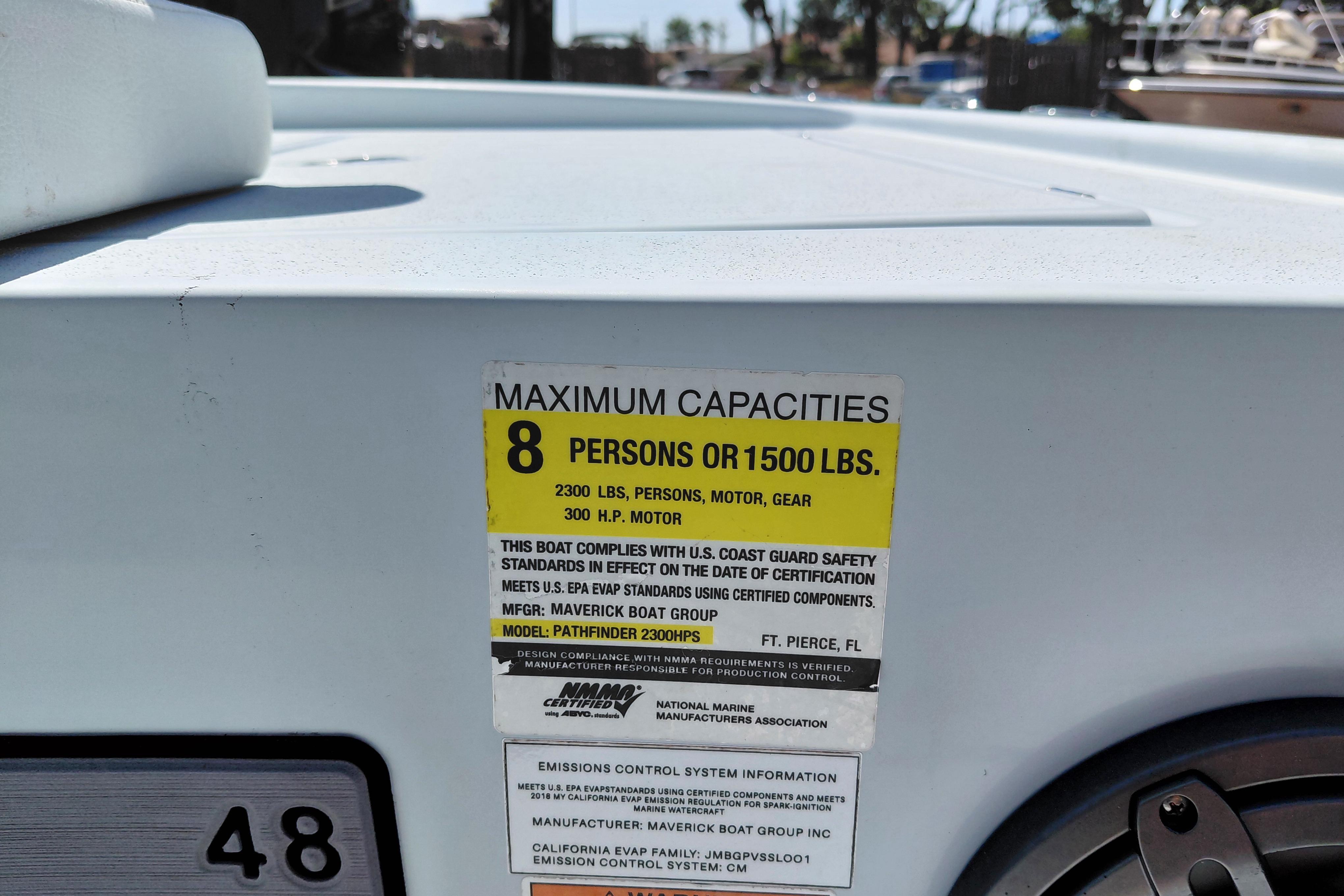 2022 Pathfinder 2300 HPS boat capacity label, maximum 8 persons or 1500 lbs.