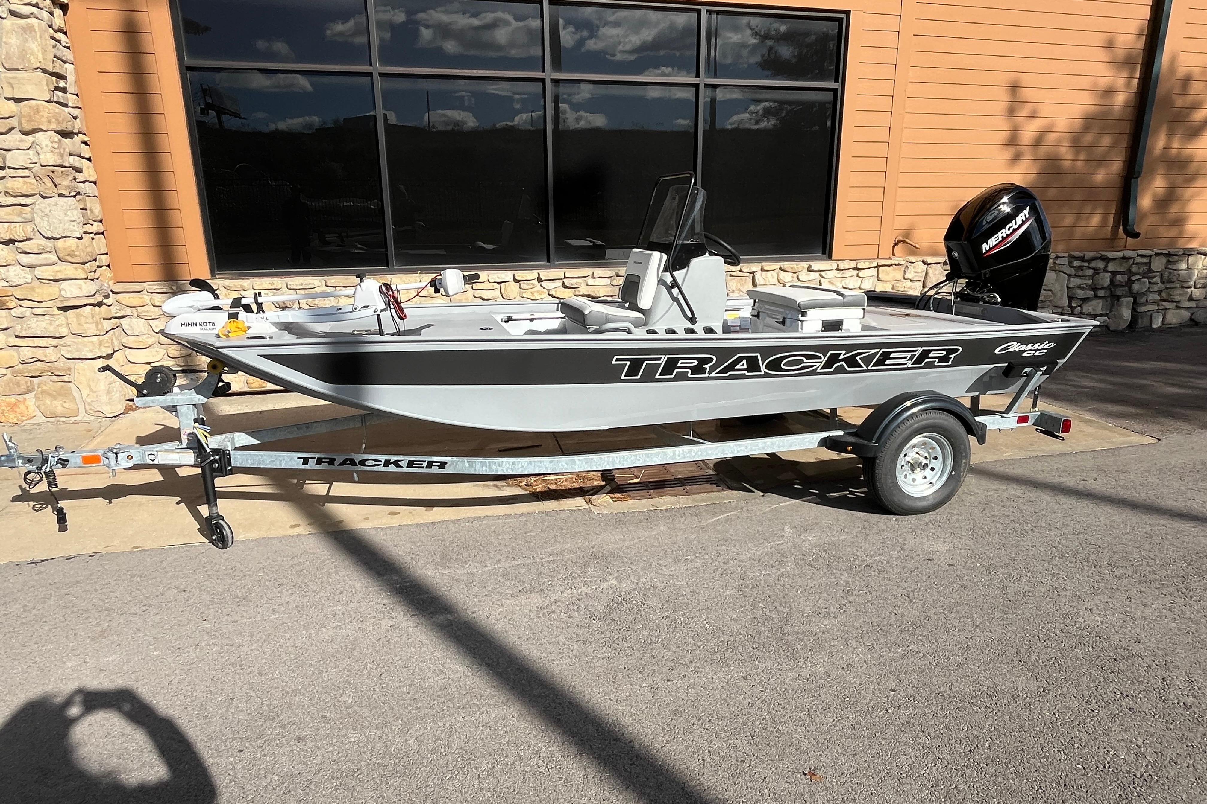 2026 Tracker Bass Tracker Classic CC boat on trailer, parked outdoors.