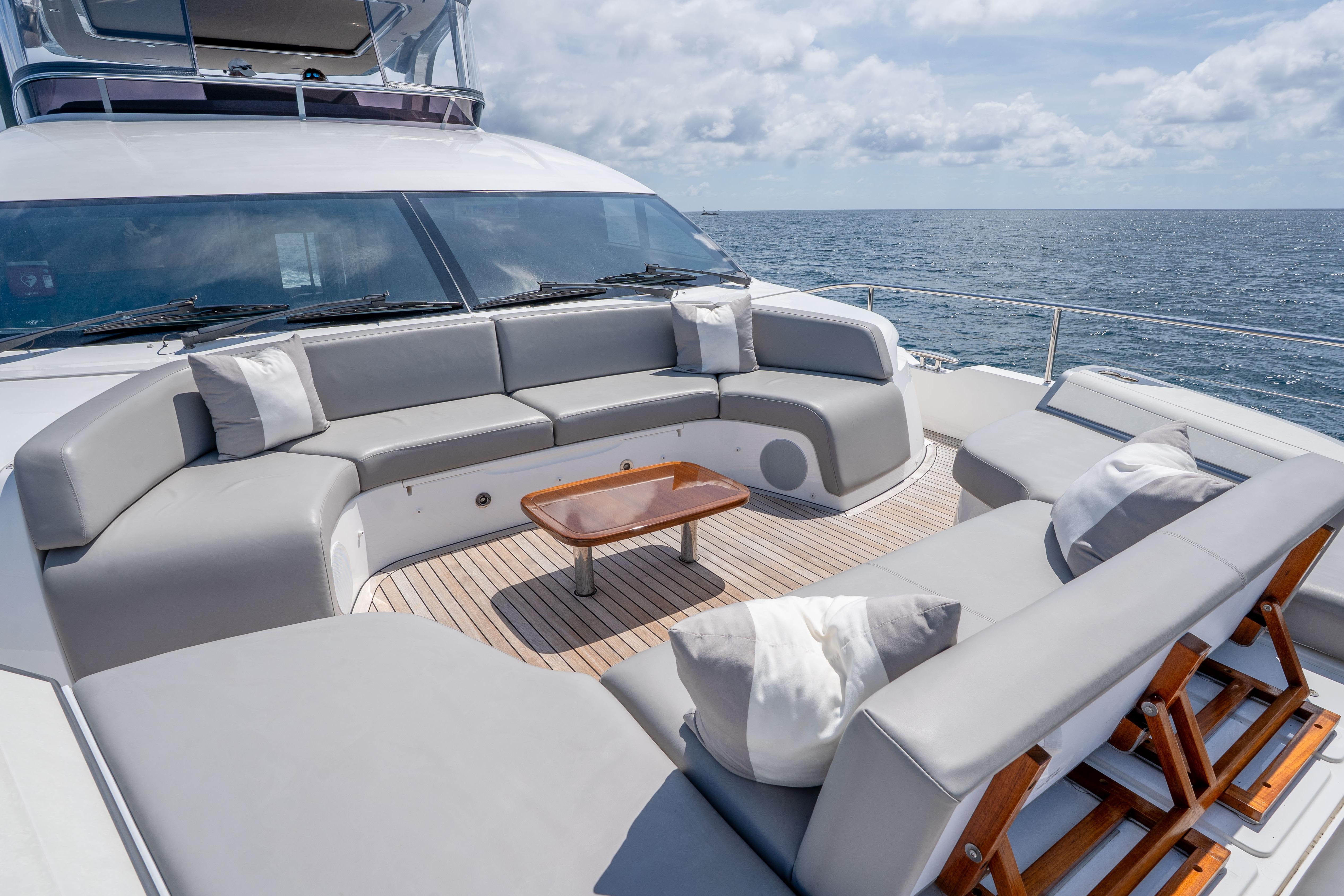 Luxurious 2020 Princess Y85 yacht deck with elegant seating and ocean view.