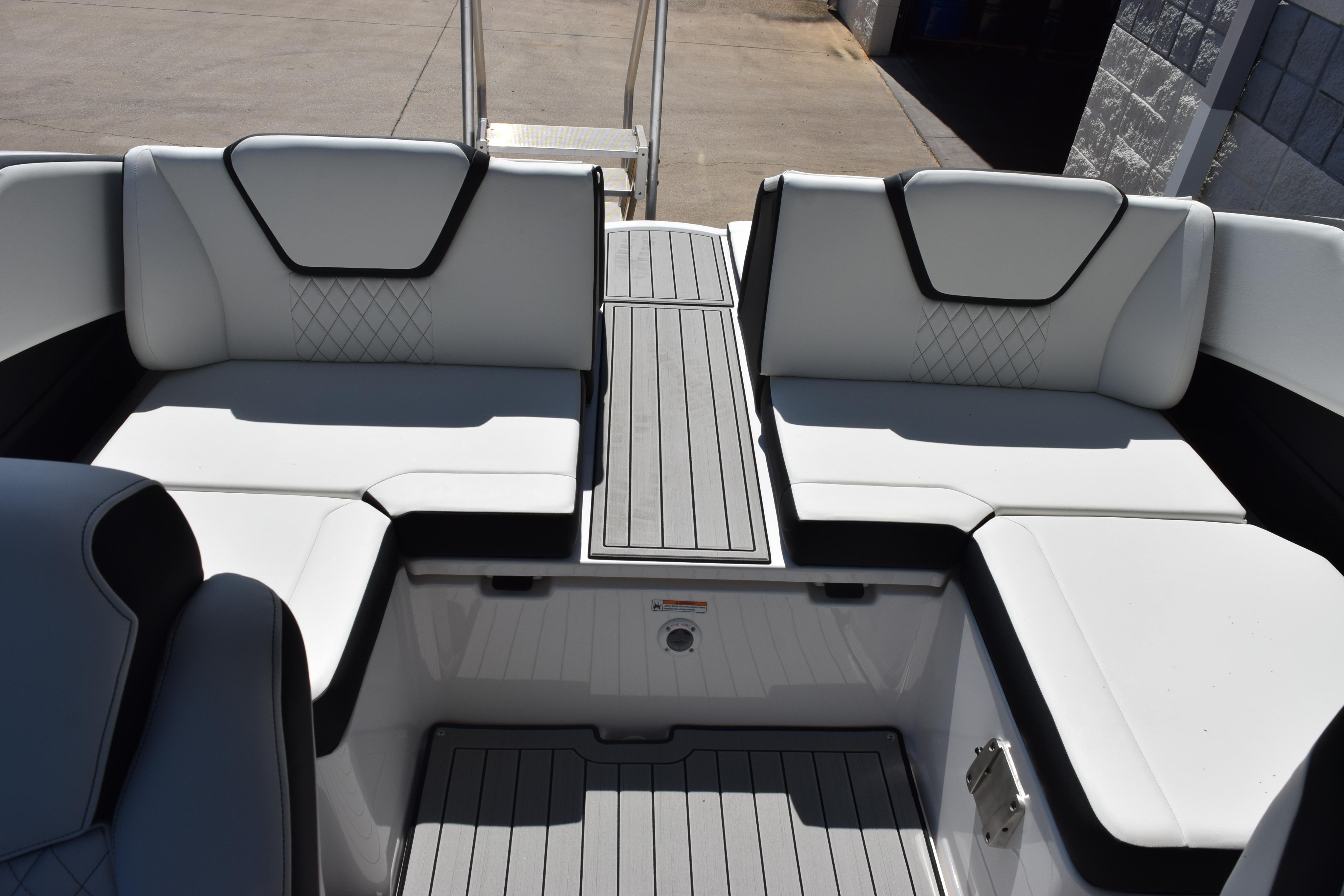 2026 Yamaha Boats 222SE interior with sleek white seating and modern design.