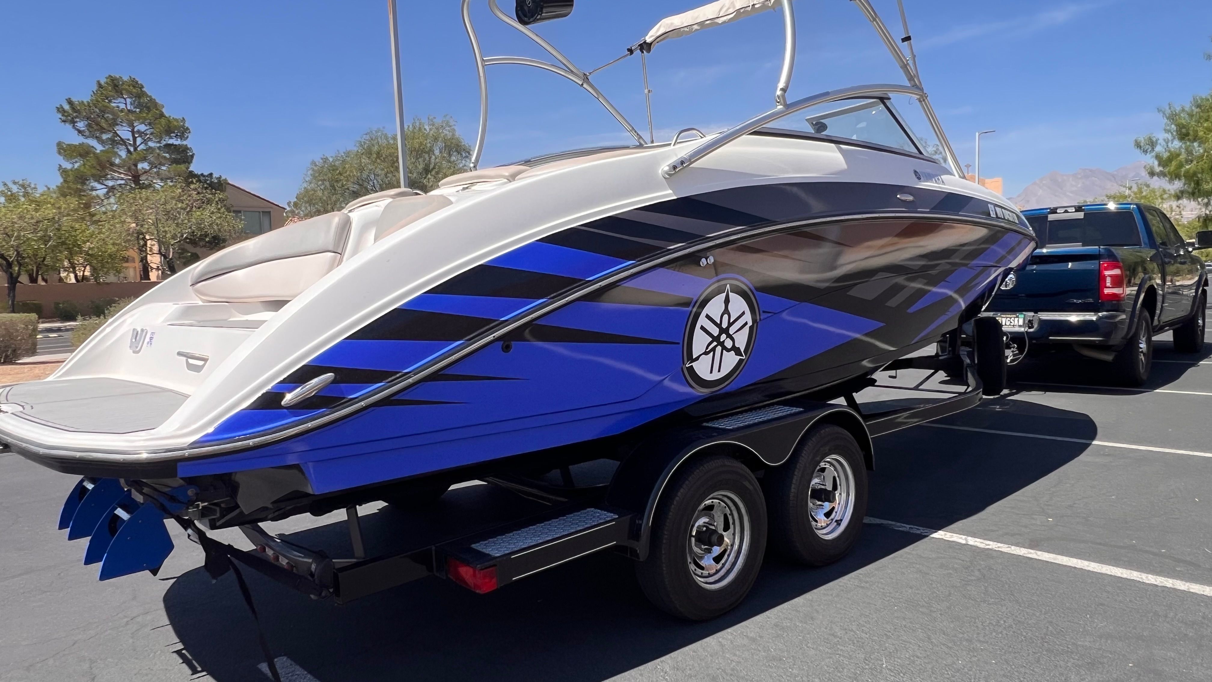 2011 Yamaha AR240 HO boat on trailer outdoors.