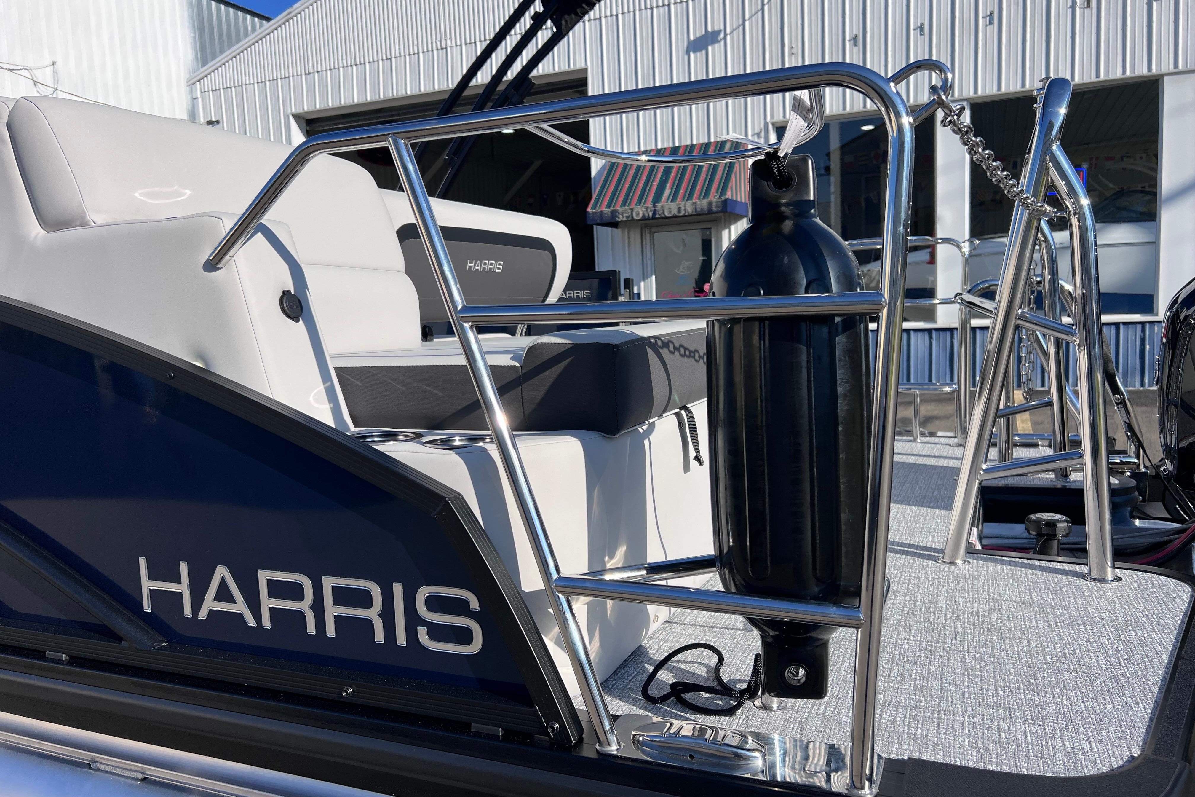 2026 Harris 210 Cruiser SLDH boat with sleek seating and safety features.