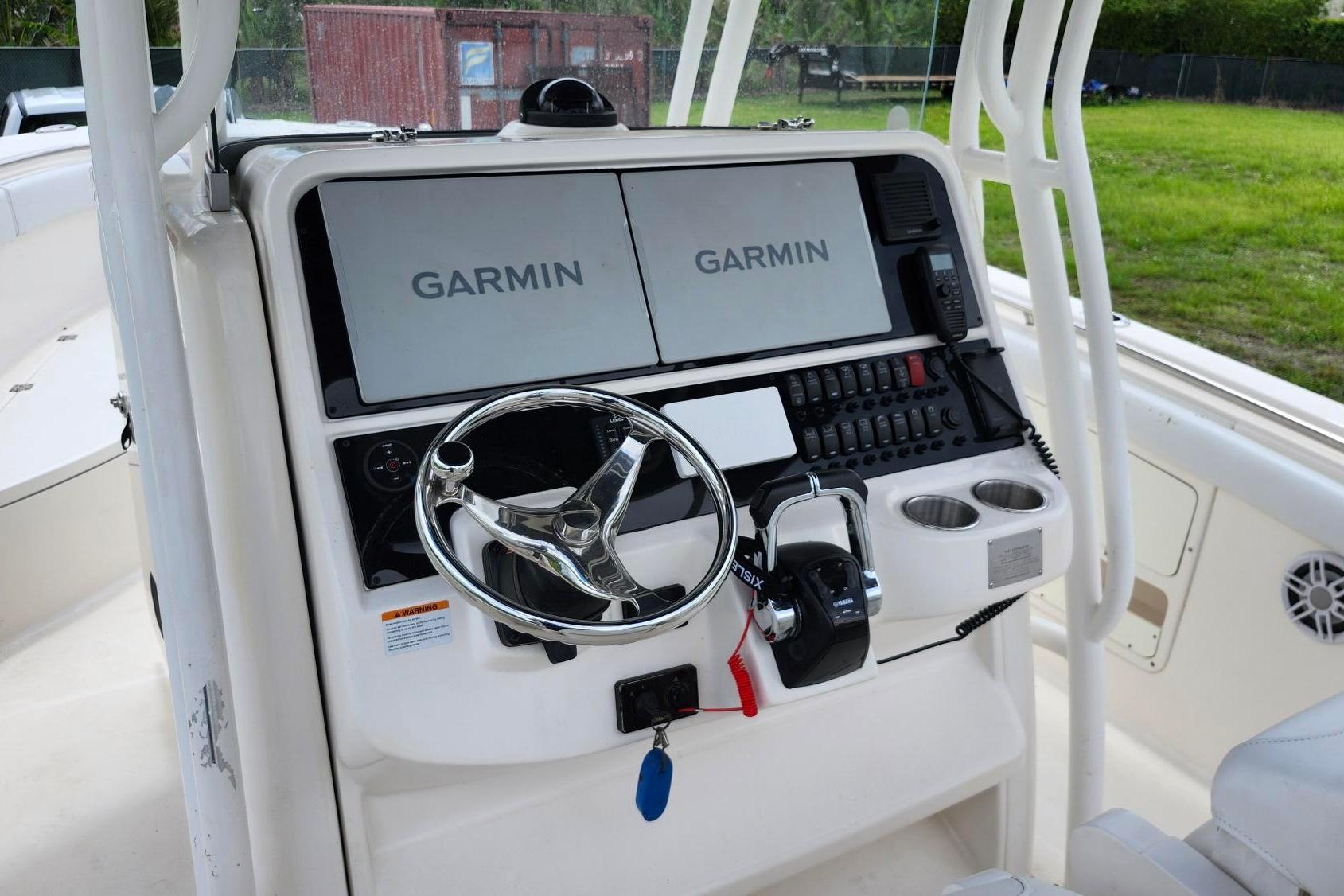 2015 Robalo R300 Center Console boat dashboard with Garmin navigation system.