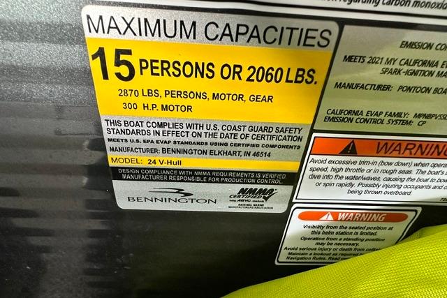 2021 Bennington L Bowrider 25 Quad Bench capacity label, 15 persons or 2060 lbs, 300 HP motor.