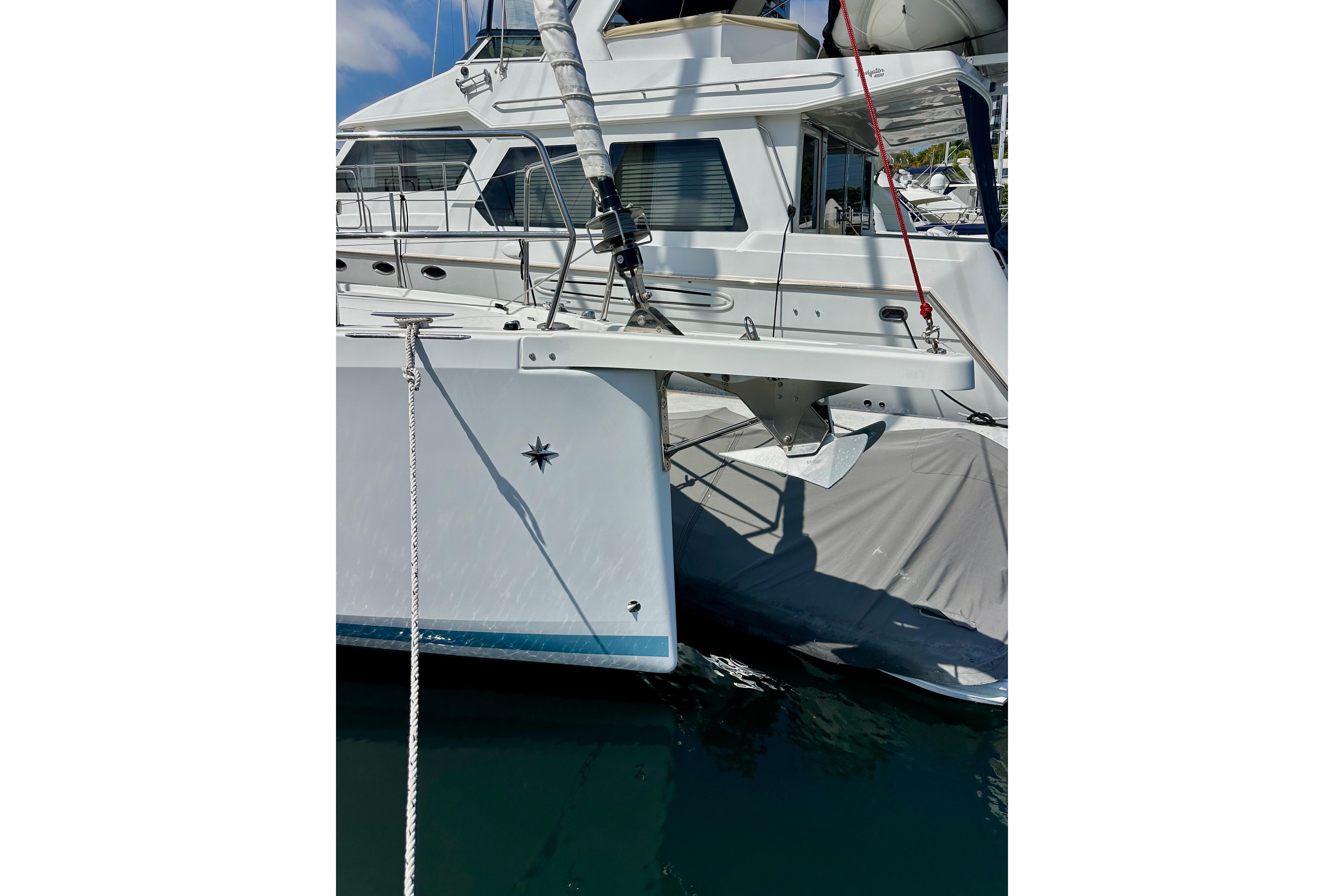 2024 Jeanneau Sun Odyssey 410 yacht docked, showcasing sleek design and modern features.