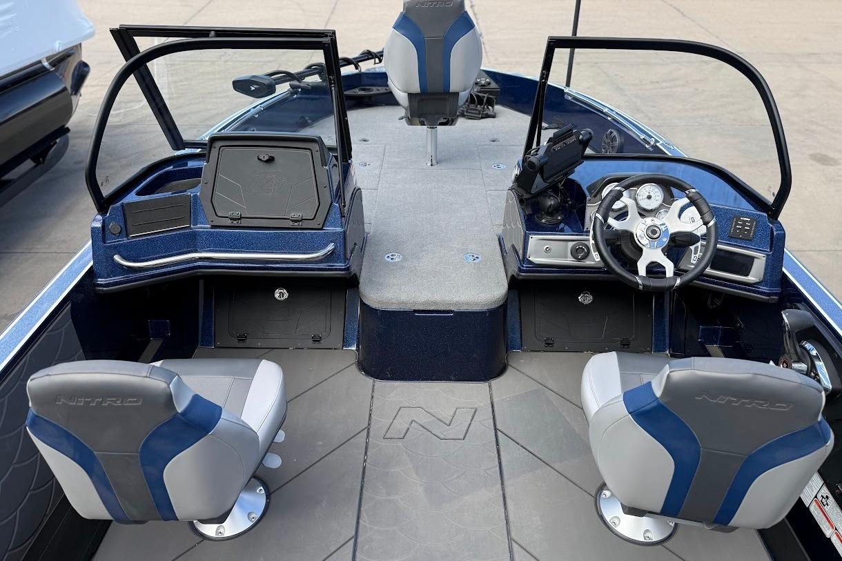 Interior of a 2026 Nitro ZV21 Pro boat with modern seating and dashboard.