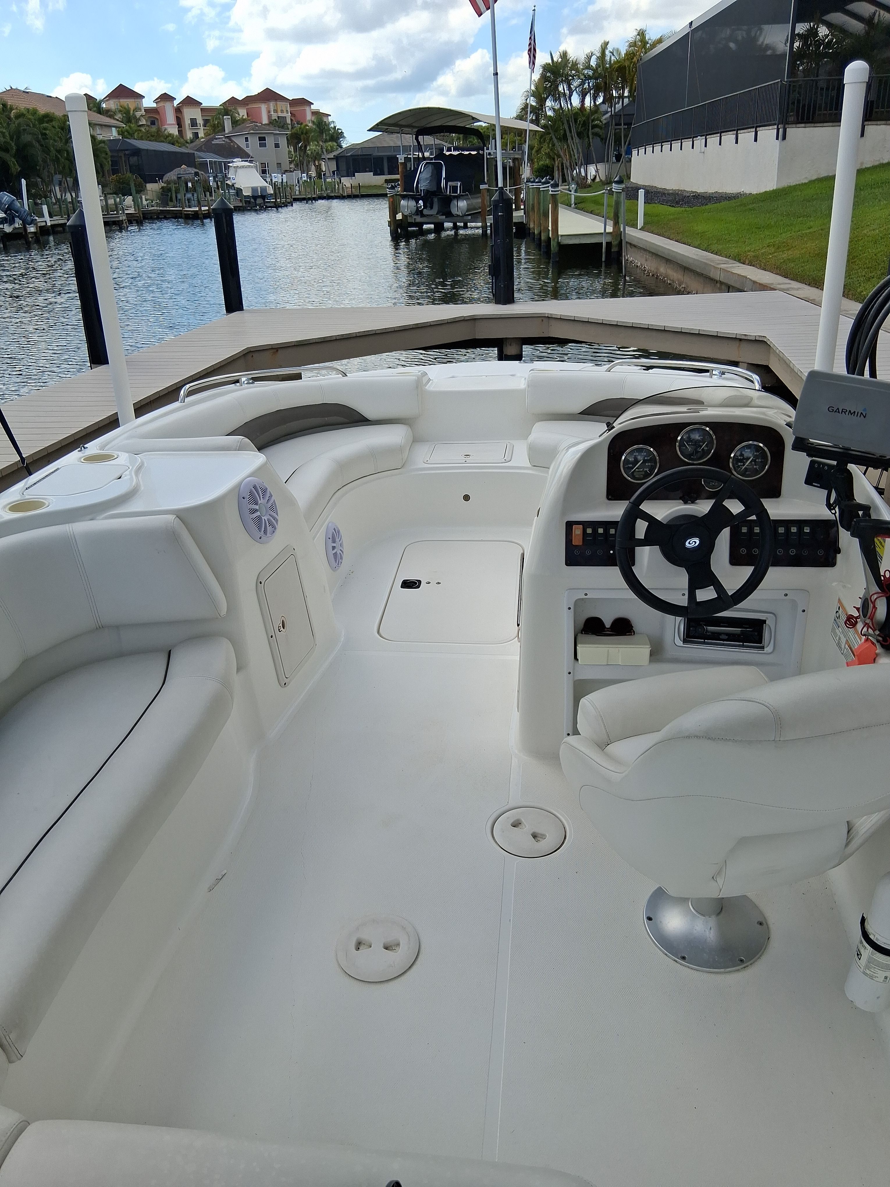 Interior view of a 2013 Hurricane 188SD boat at dock.