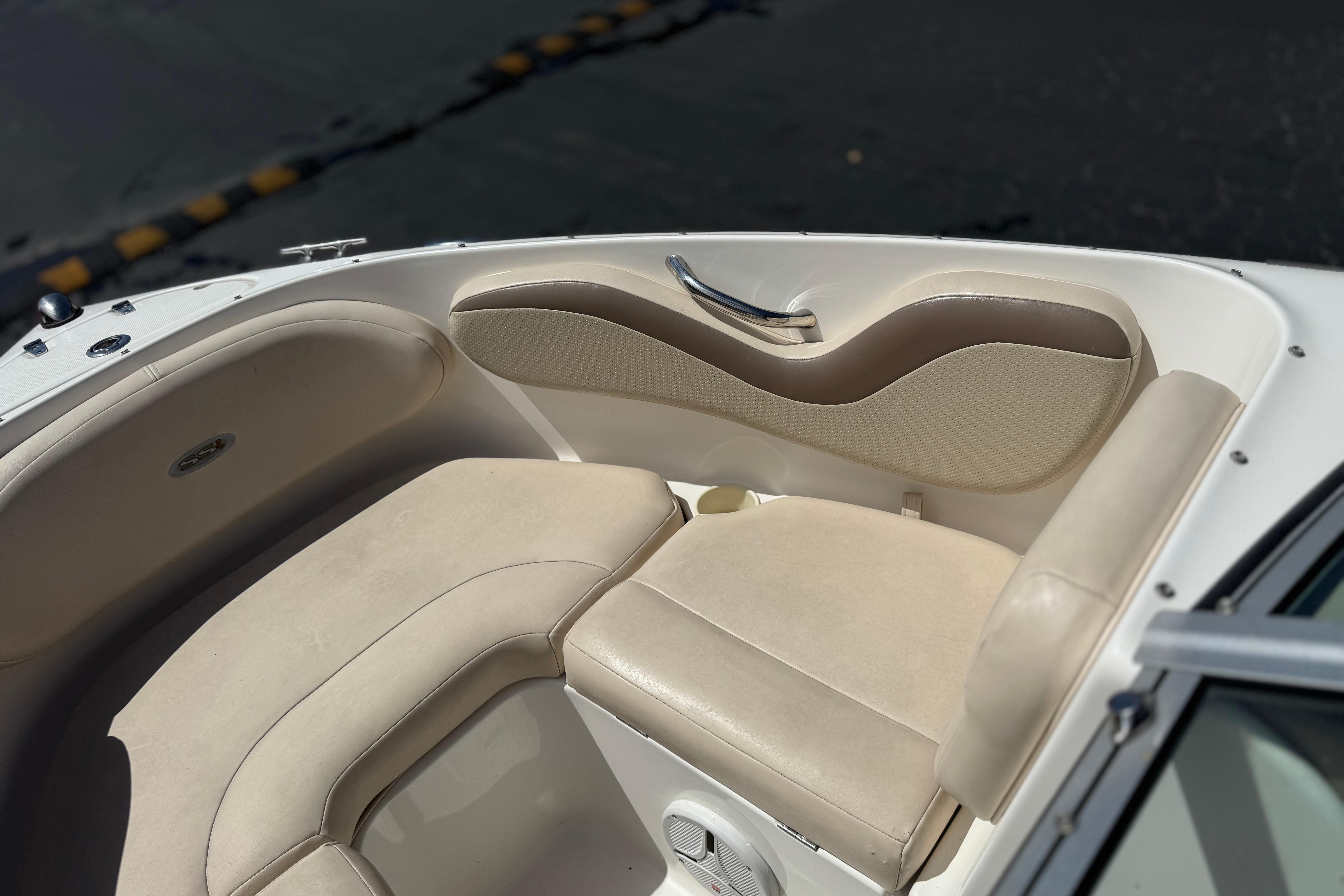 2006 Chaparral 190 SSi boat interior with beige seating and sleek design.