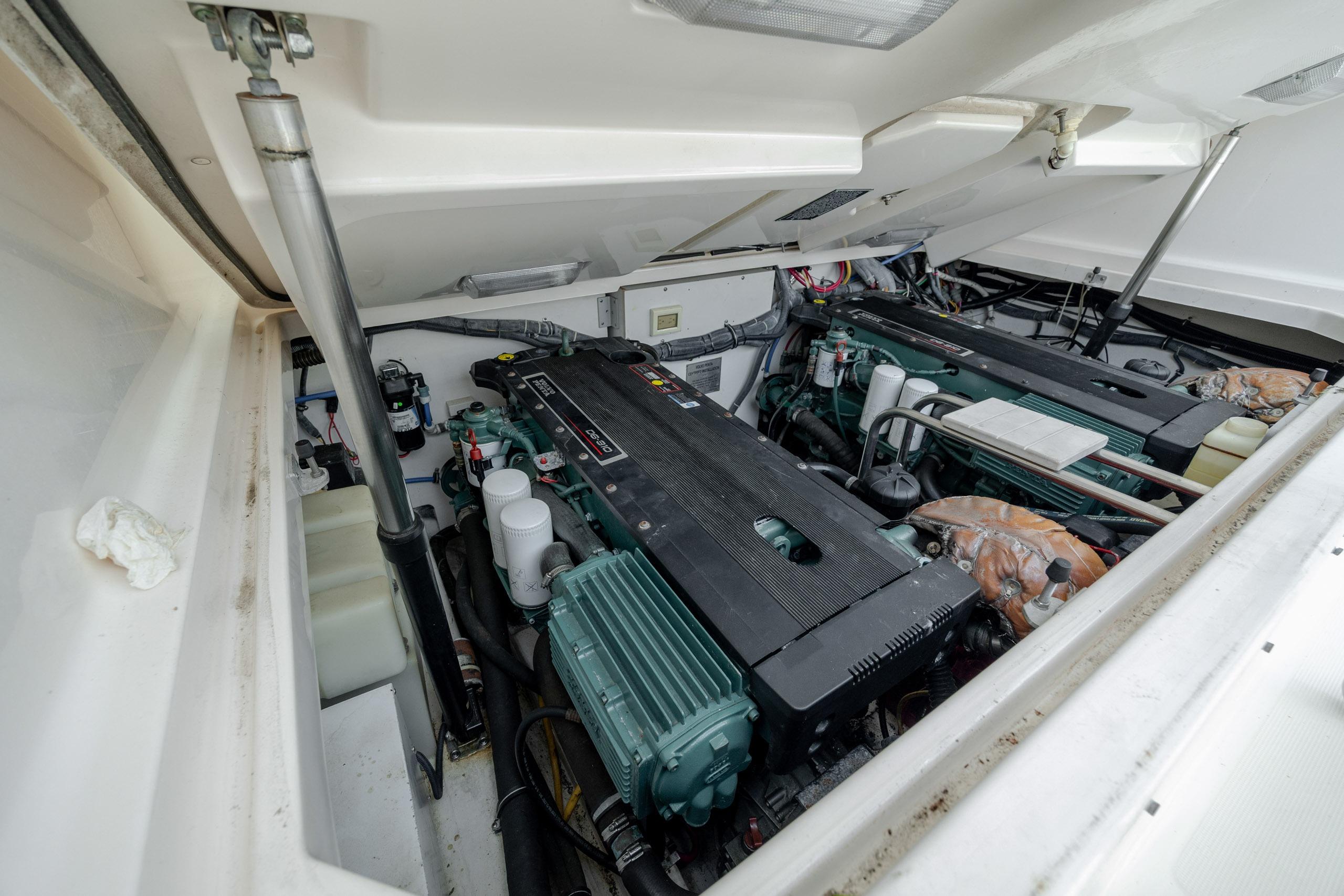 Engine compartment of a 2004 Tiara Yachts 3200 Open, showcasing dual engines.