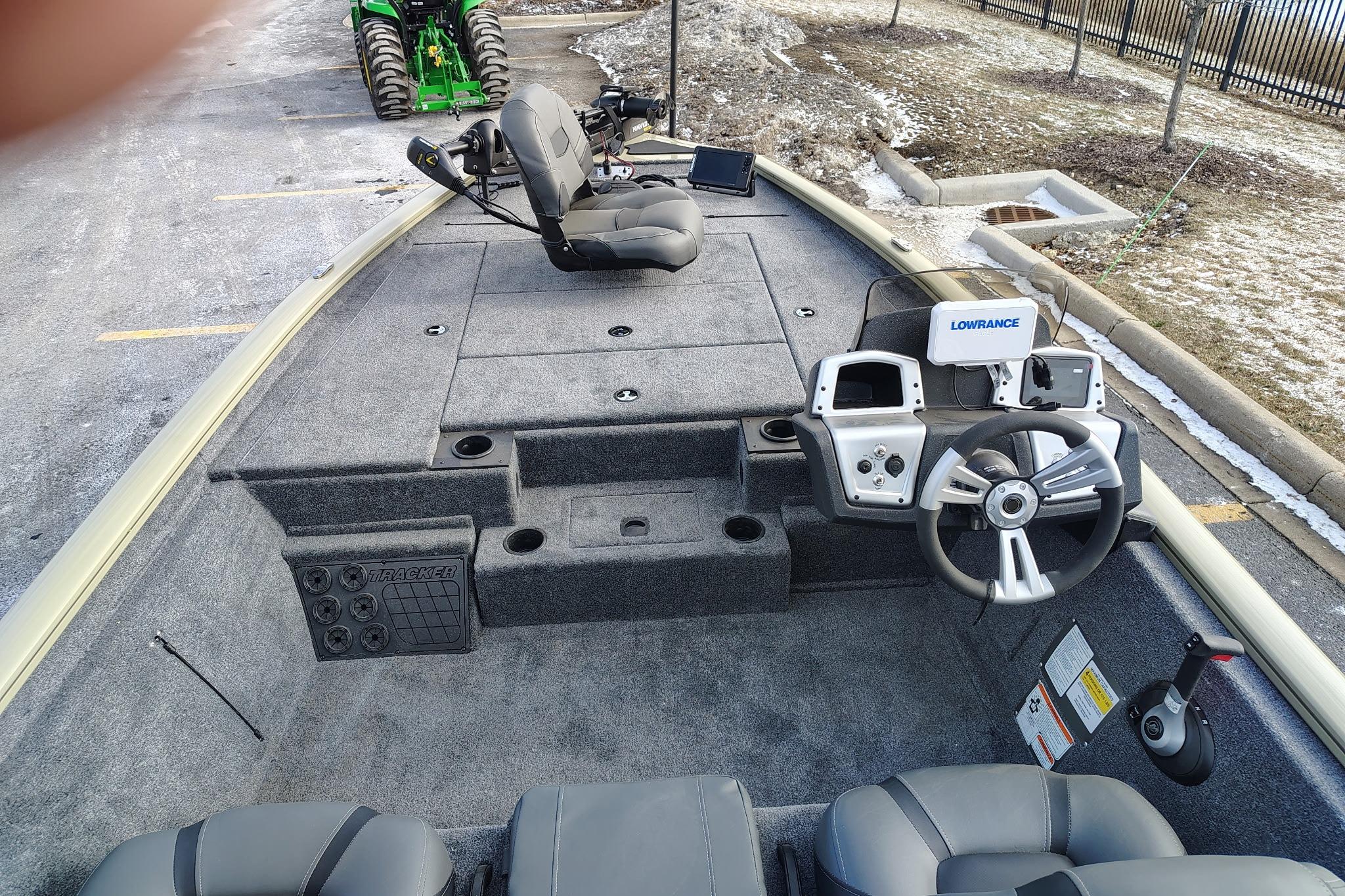 2026 Tracker Pro Team 195 boat interior with steering wheel and seating.