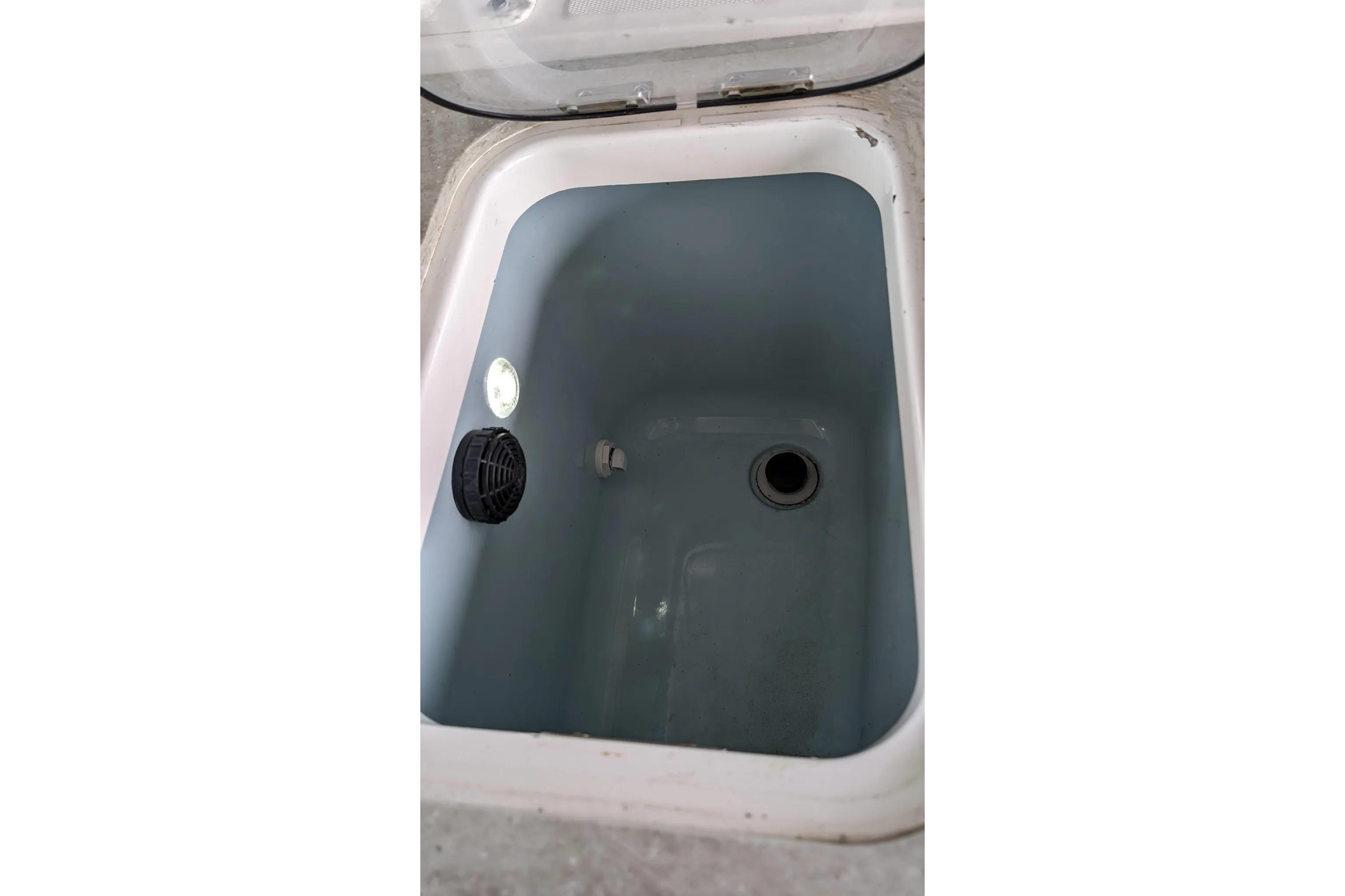 Livewell compartment on a 2017 Boston Whaler 320 Vantage boat.