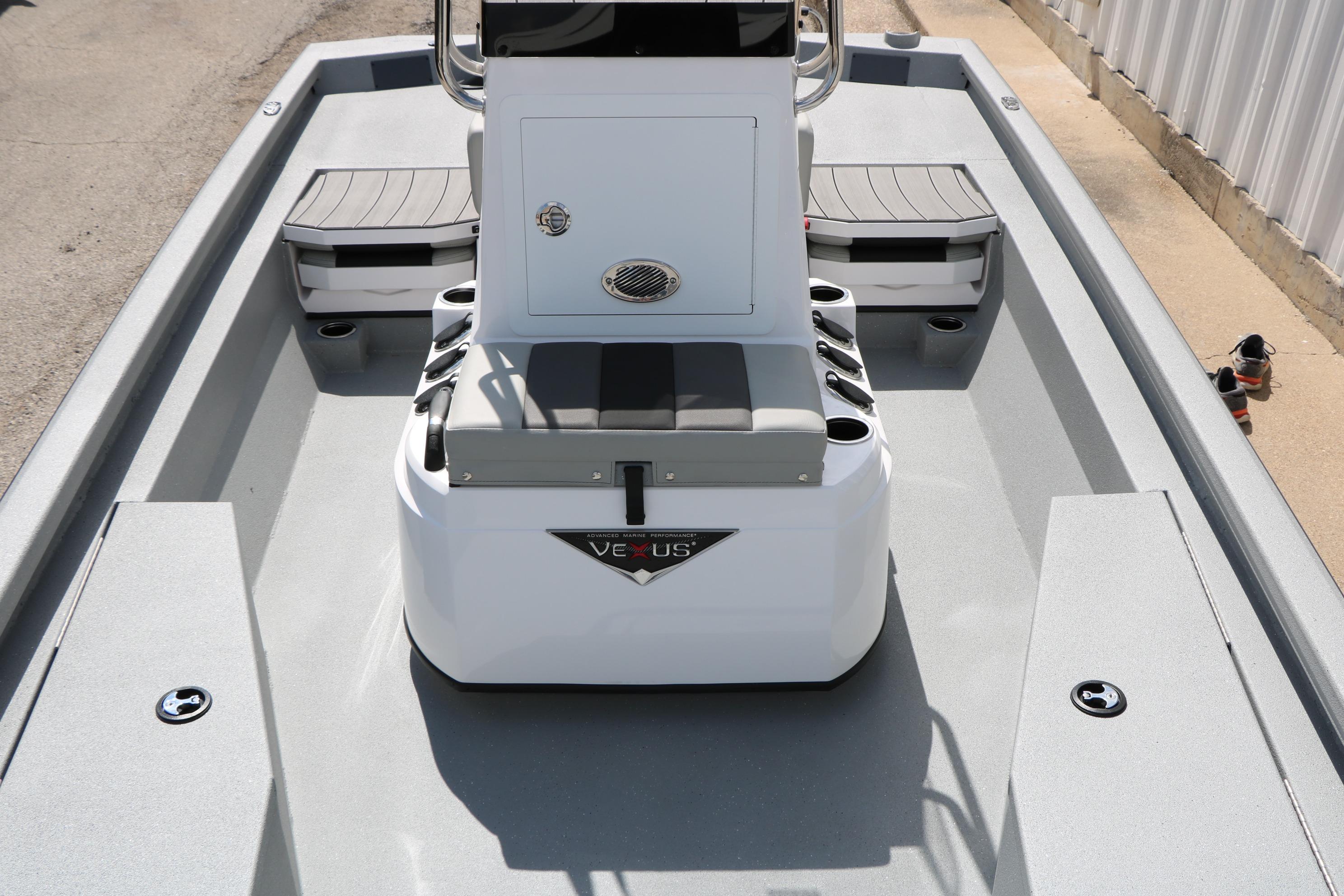 2026 Vexus Defender 201 boat interior with seating and console, showcasing modern design.