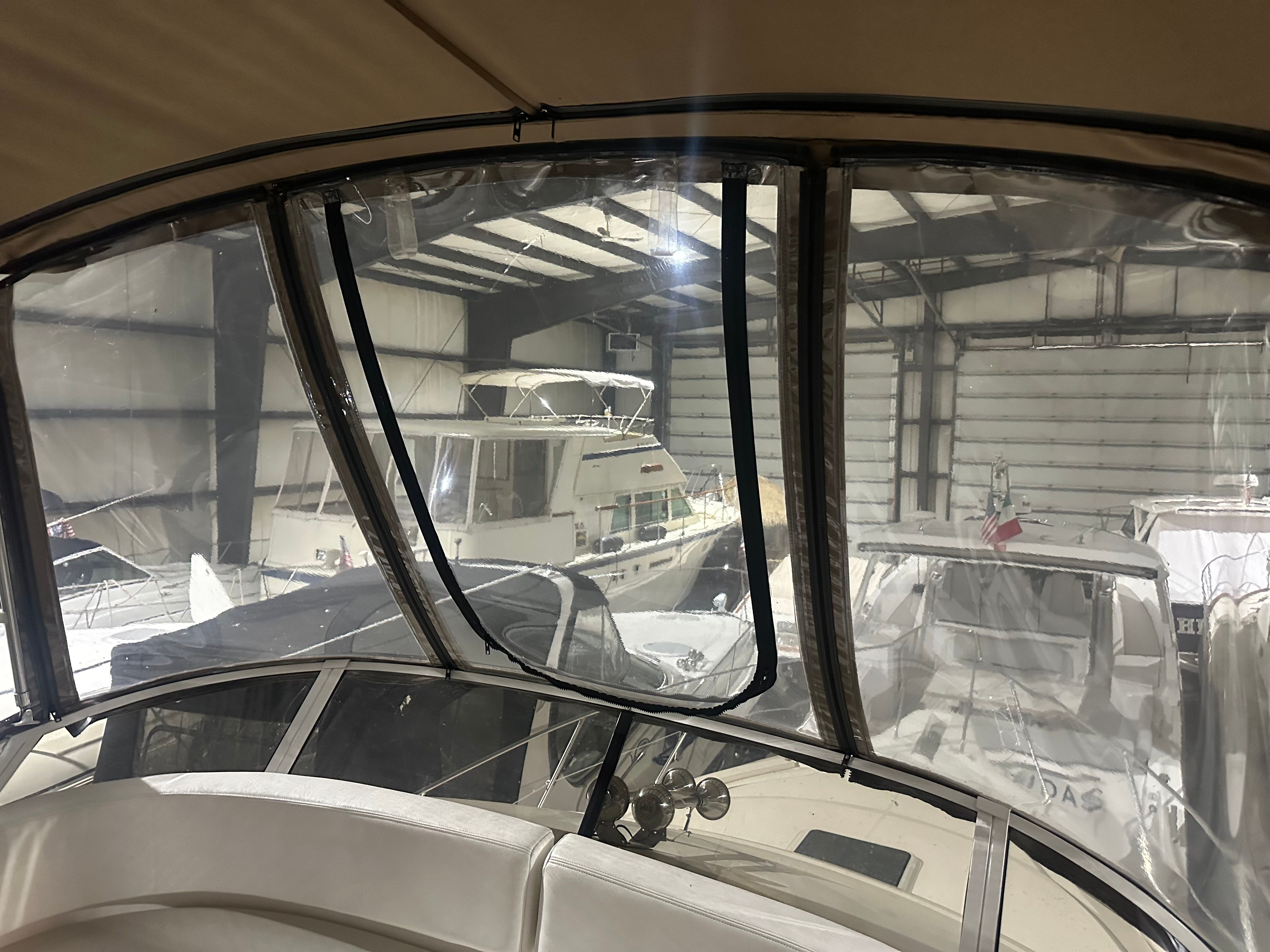 Interior view of a 1998 Silverton 351 Sedan in a boat storage facility.
