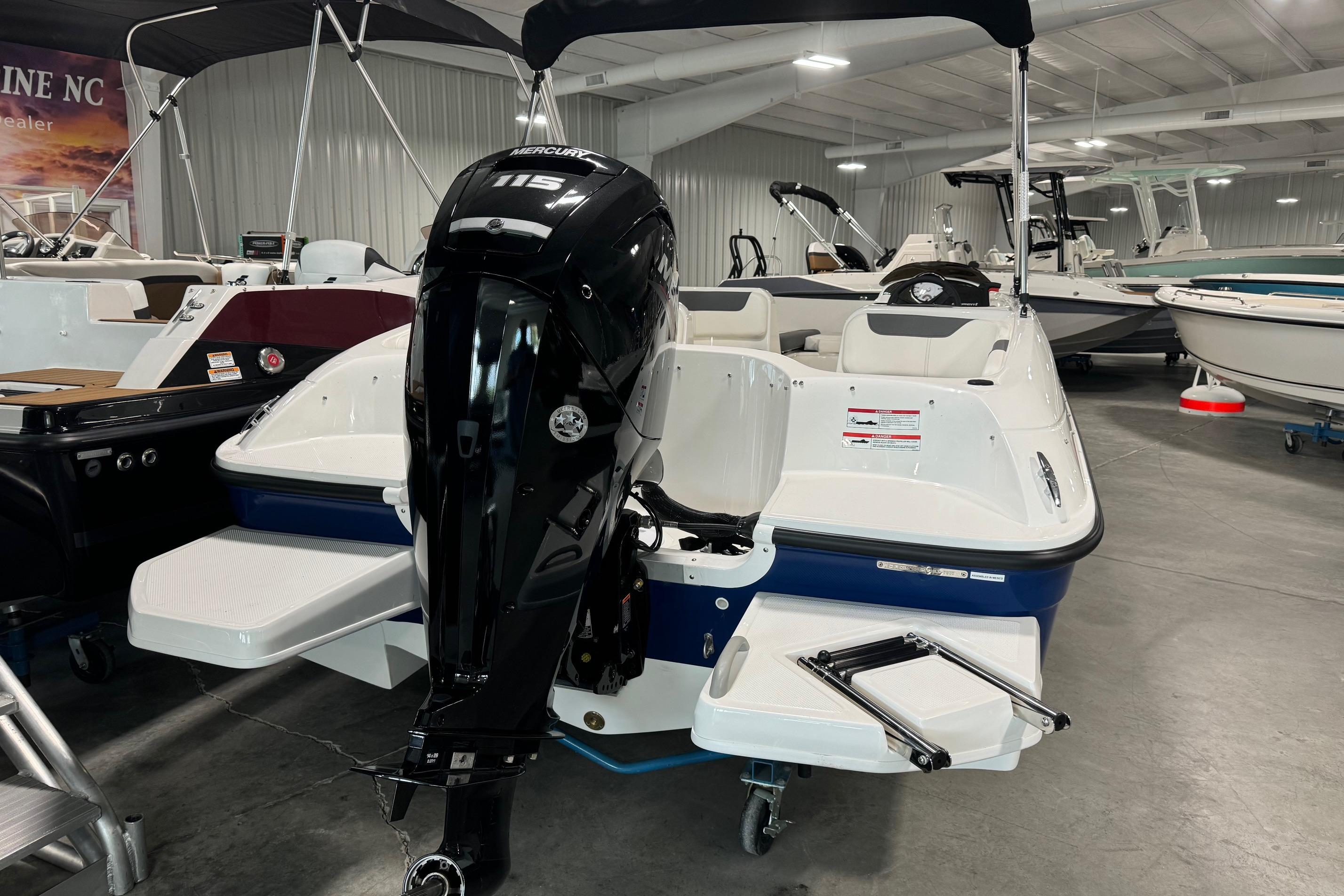 2025 Bayliner Element E18 boat with Mercury 115 engine in showroom.