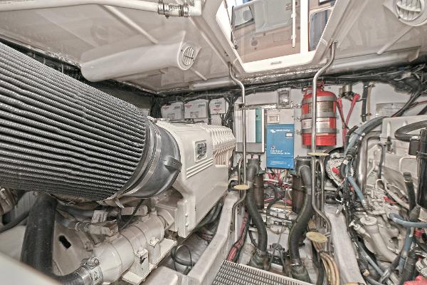 Engine room of 2008 Tiara Yachts 4200 Open, showcasing mechanical components and systems.