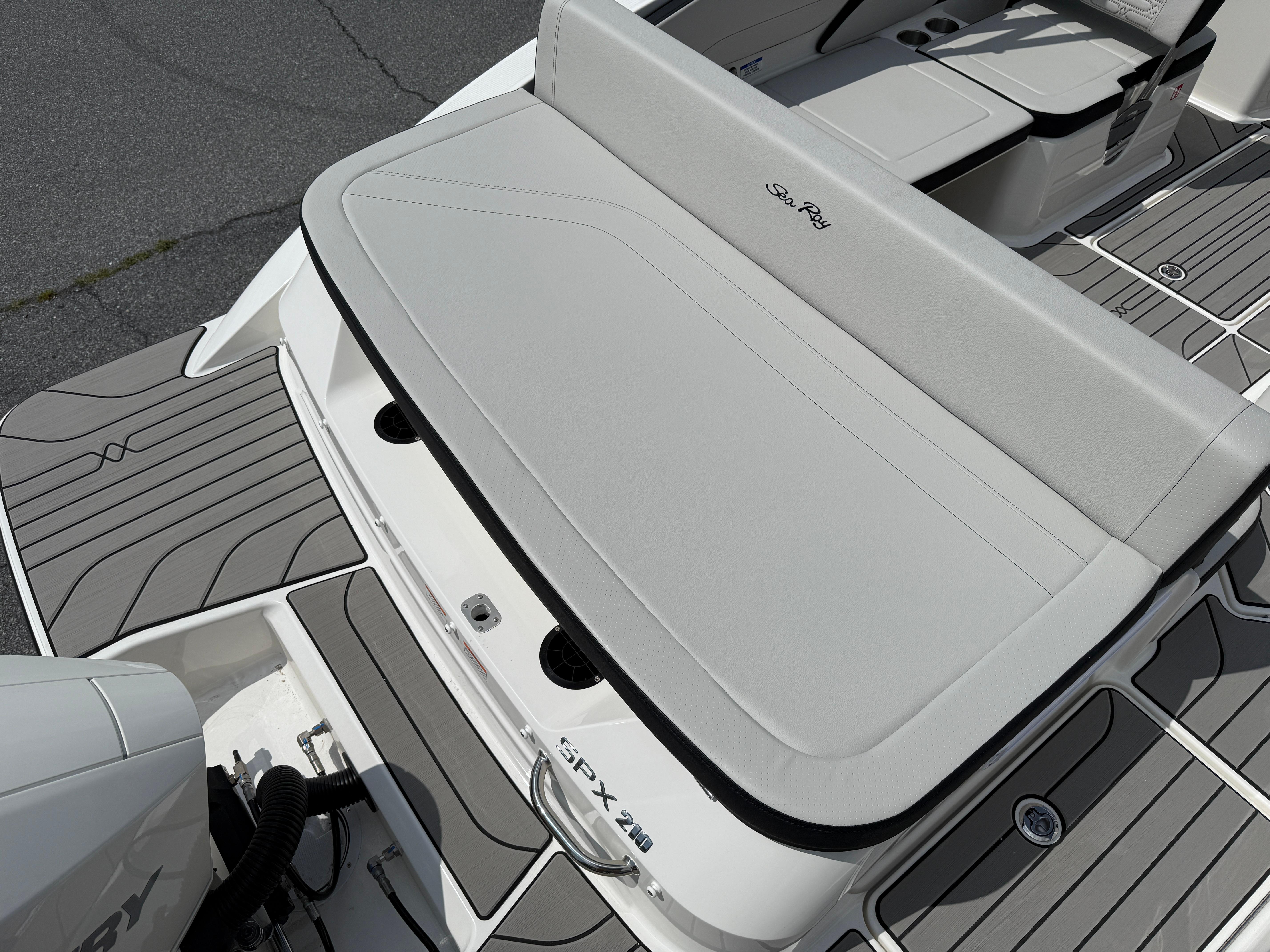 2026 Sea Ray SPX 210 Outboard boat with sleek seating and modern design.