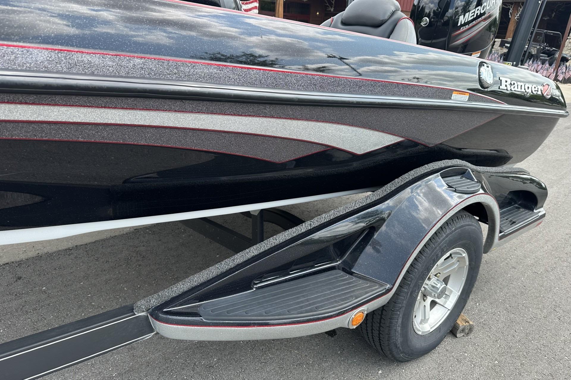 2018 Ranger Z518 boat on trailer, showcasing sleek black and red design.